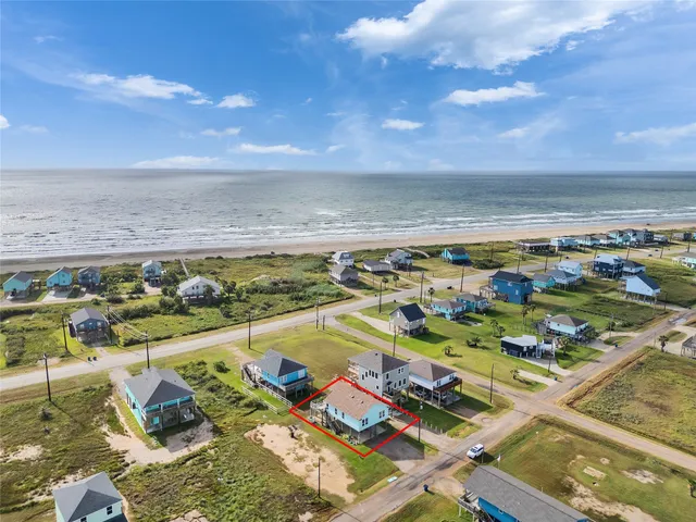 a living room filled with furniture hardwood floor and a table