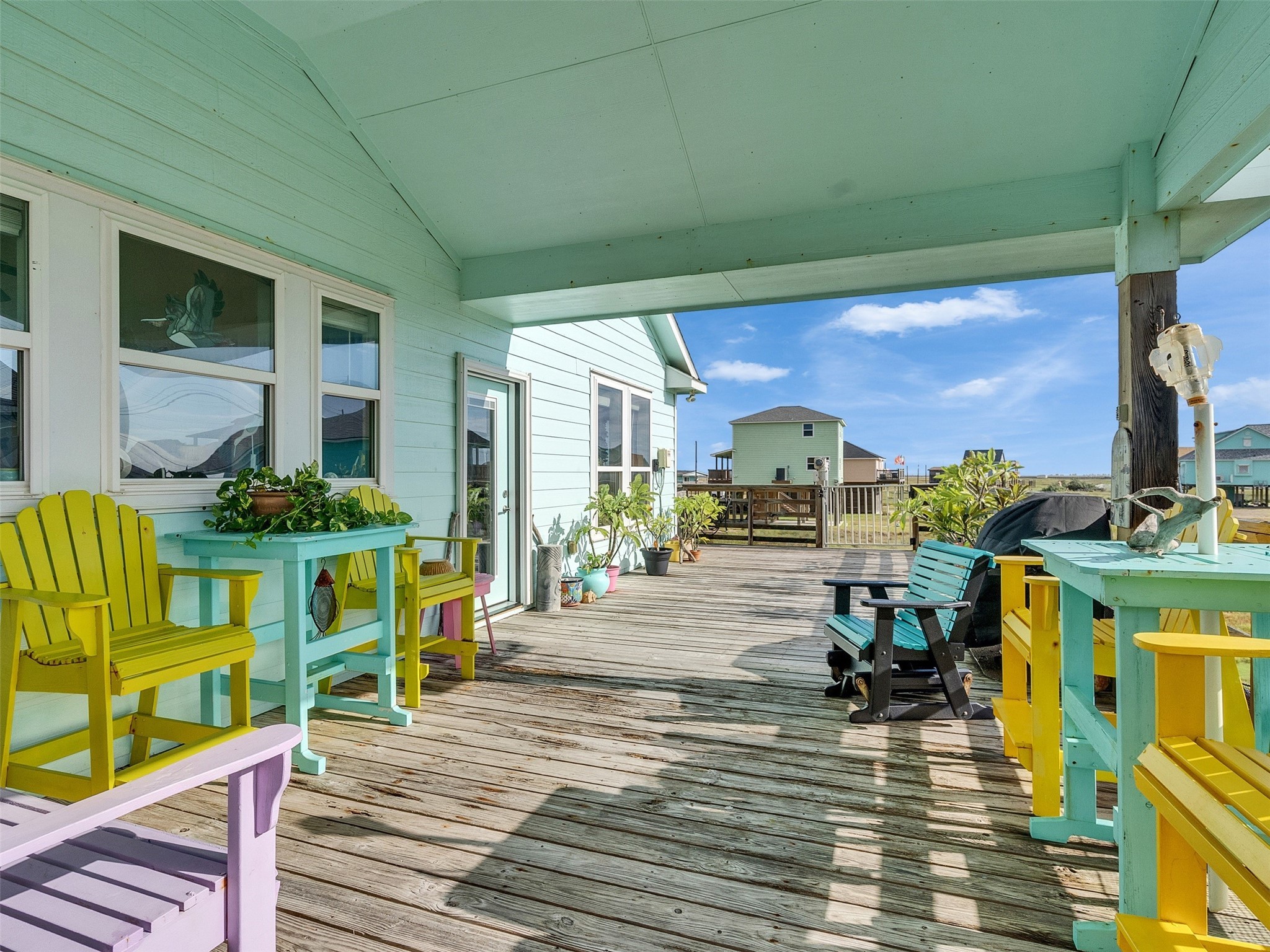 4710 Palm Street Freeport, TX 77541 - Photo 8 of 23 a living room filled with furniture hardwood floor and a table