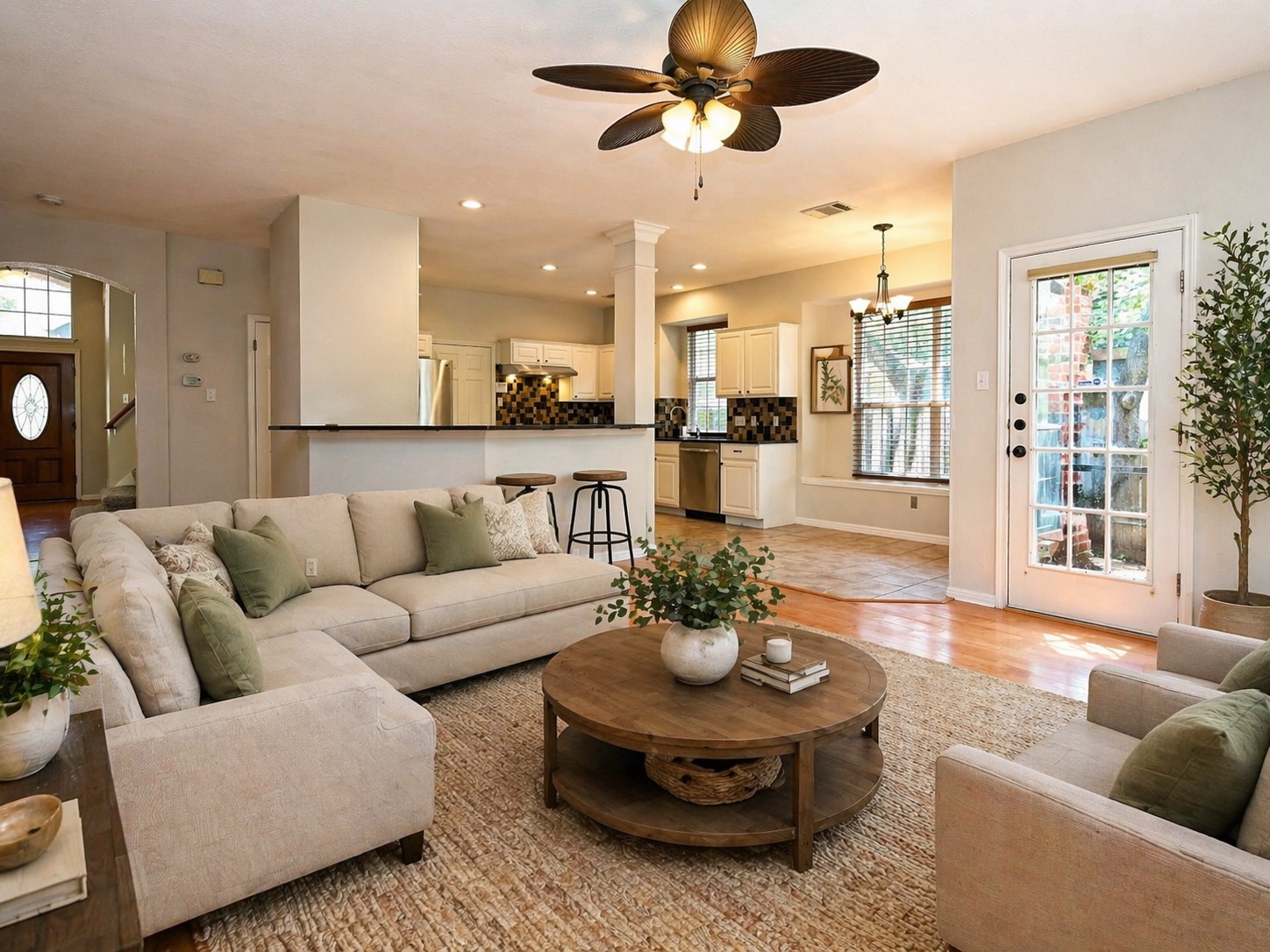 11017 Rio Vista Drive Austin, TX 78726 - Photo 15 of 38 Virtually-staged: Spacious living area featuring wood-finish flooring and a ceiling fan