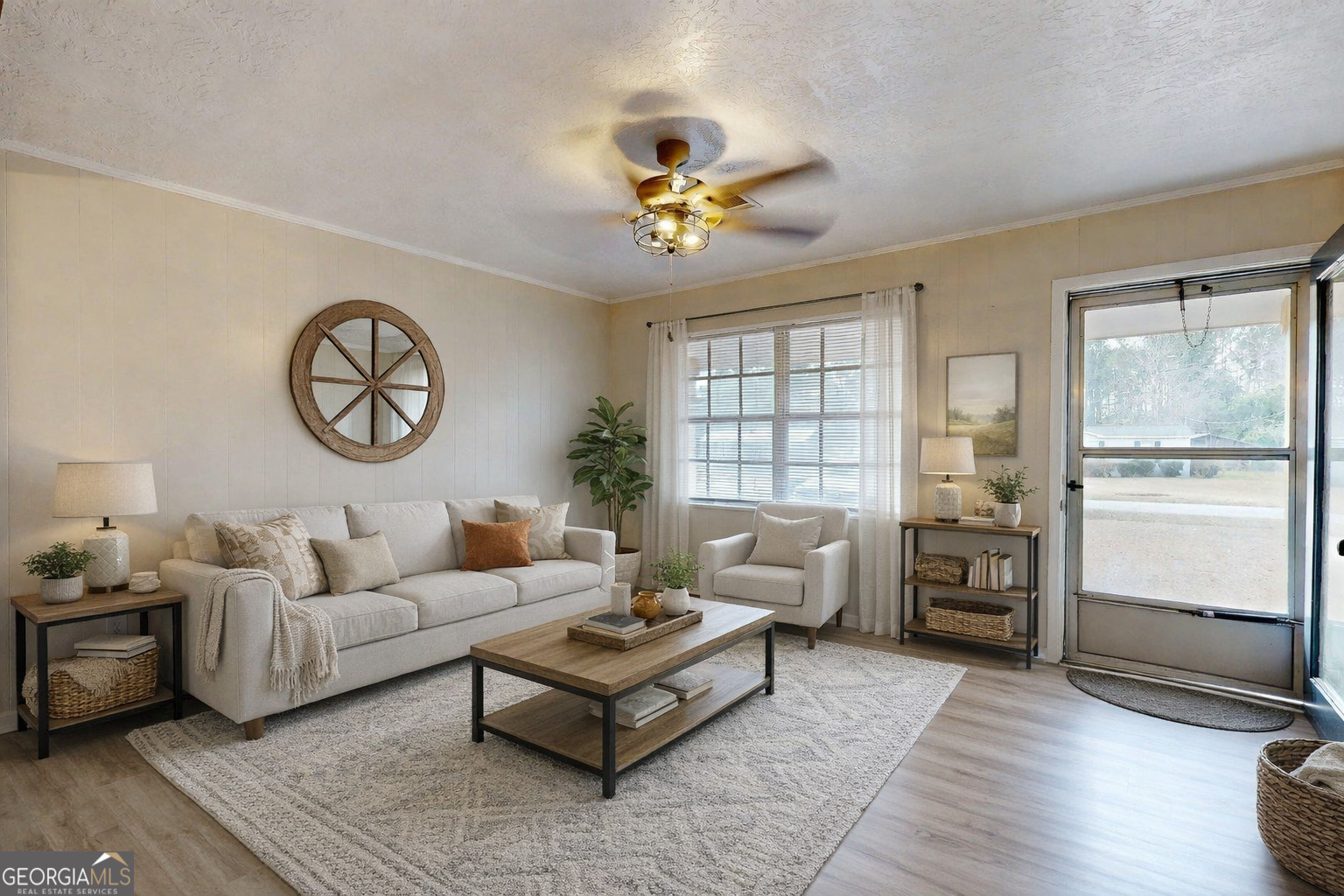 423 Richards Avenue Millen, GA 30442 - Photo 2 of 30 a living room with furniture and a window