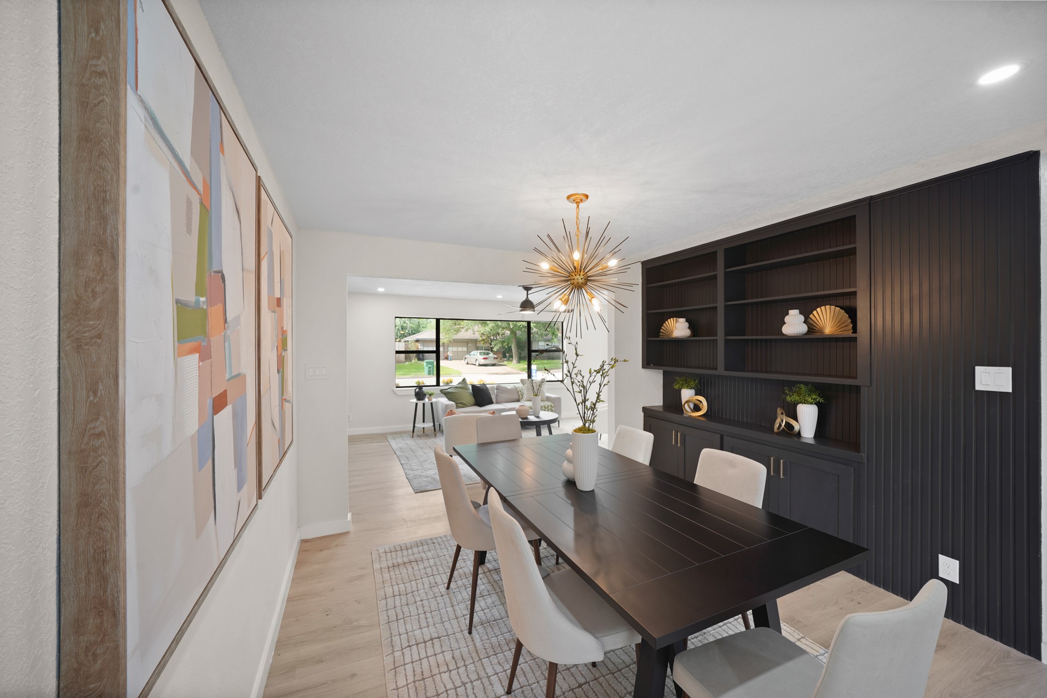4813 Hummingbird Street Houston, TX 77035 - Photo 8 of 50 Additional Amenities in the Dining Area include Wide Plank White Oak Hued Engineered Floors and LED Flush Mounts. The Dining Area is adjacent to the Kitchen for Ease in serving Meals.