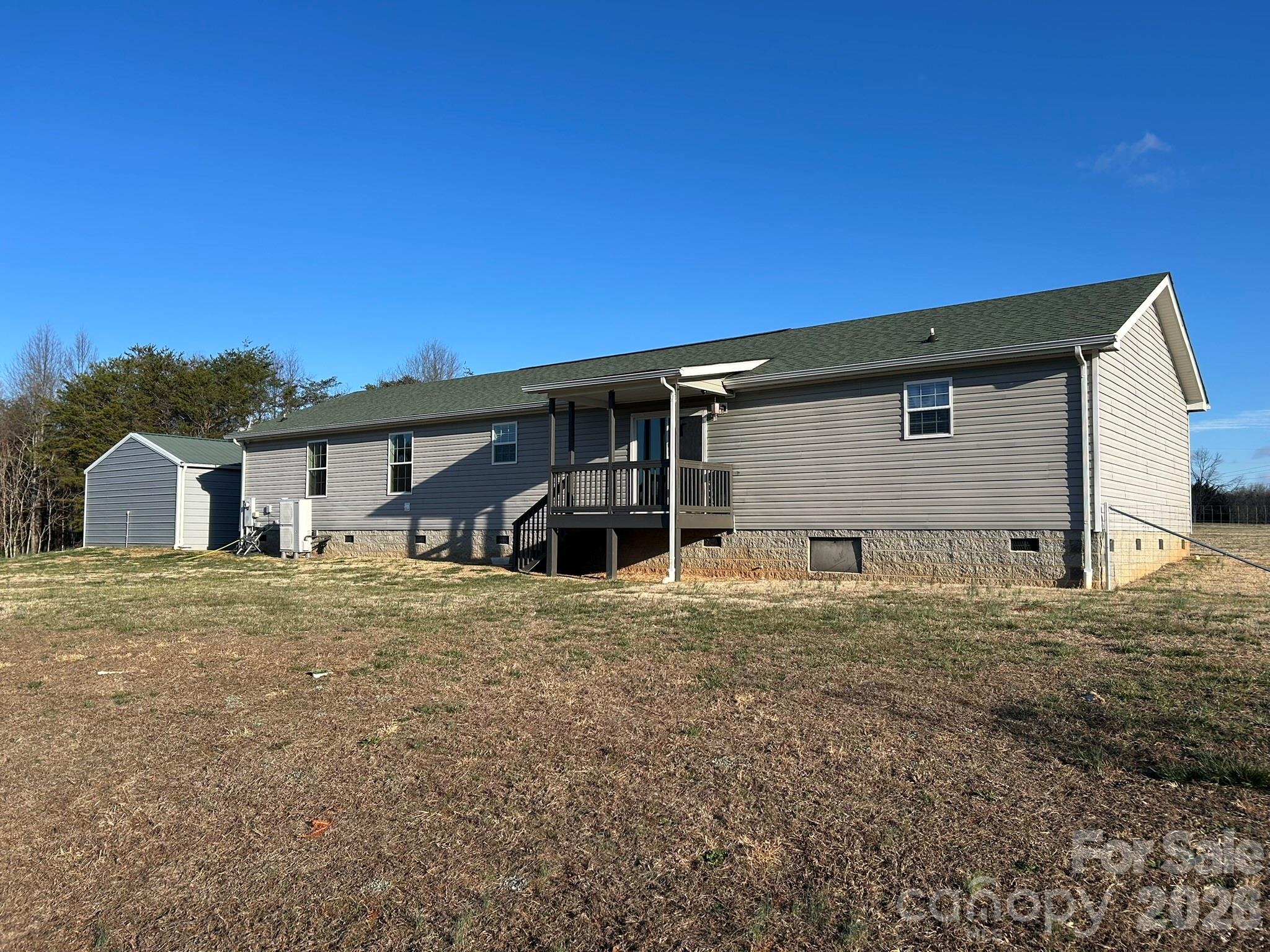 3343 Hollis Road Ellenboro, NC 28040 - Photo 11 of 48 a front view of a house with a yard