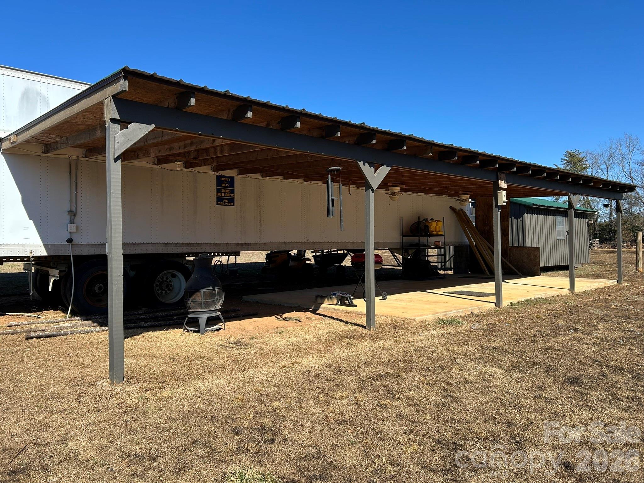 3343 Hollis Road Ellenboro, NC 28040 - Photo 13 of 48 a view of a house with a snow in the yard