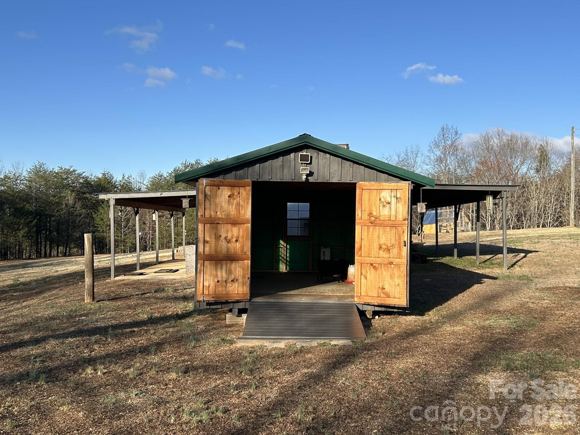 3343 Hollis Road Ellenboro, NC 28040 - Photo 14 of 48 a front view of a house with a yard
