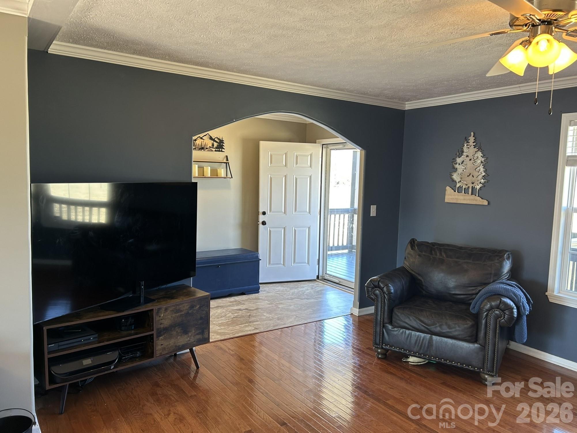 3343 Hollis Road Ellenboro, NC 28040 - Photo 17 of 48 a living room with furniture and a flat screen tv