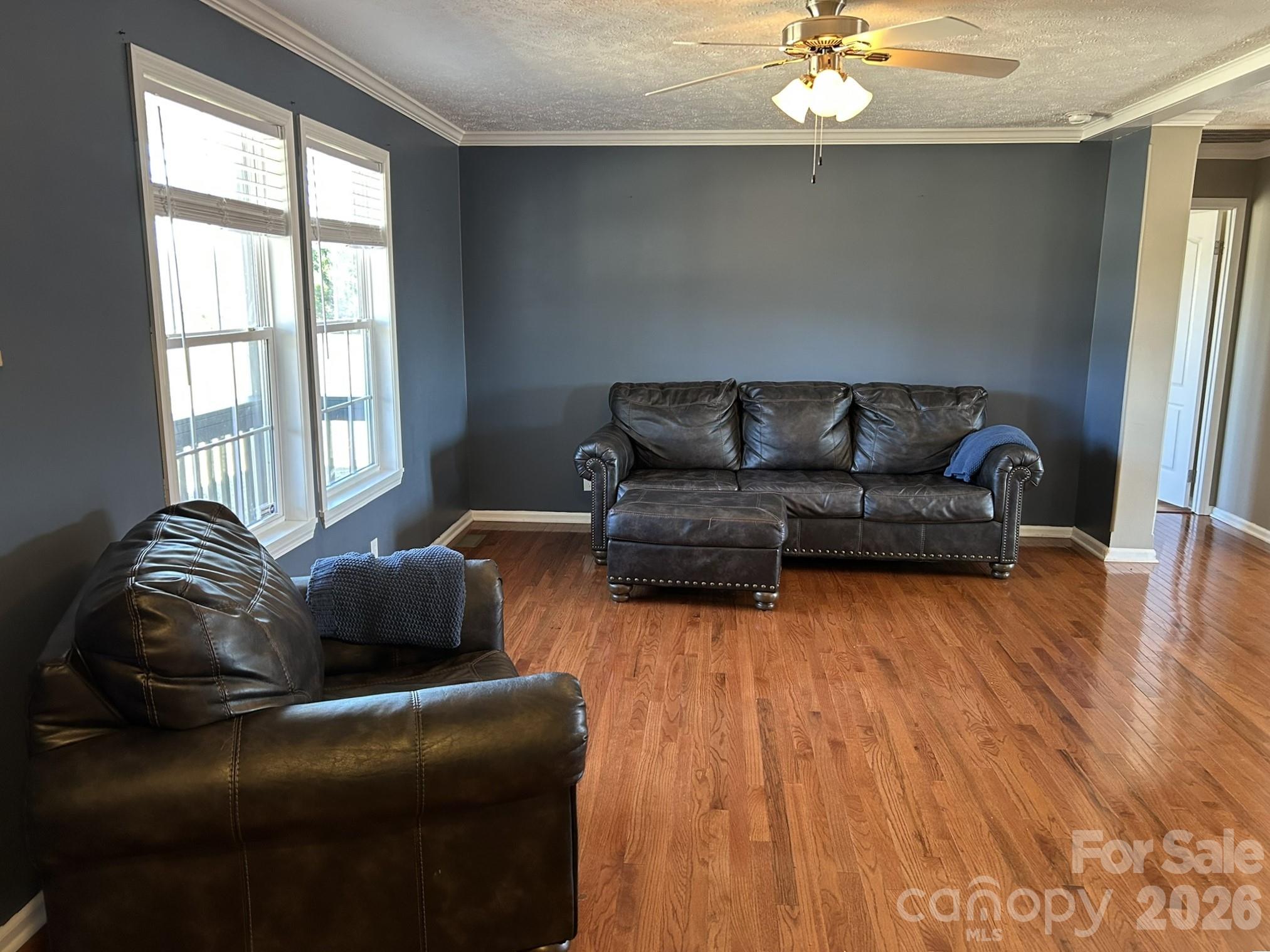 3343 Hollis Road Ellenboro, NC 28040 - Photo 20 of 48 a living room with furniture and wooden floor