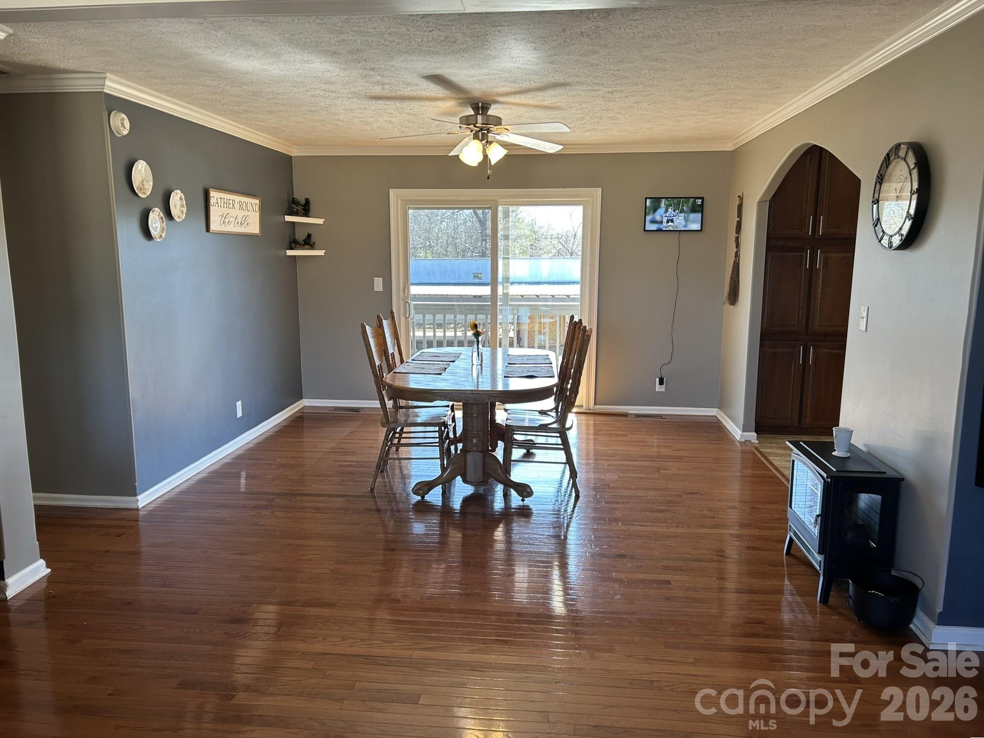 3343 Hollis Road Ellenboro, NC 28040 - Photo 22 of 48 a view of a dining room with furniture window and wooden floor