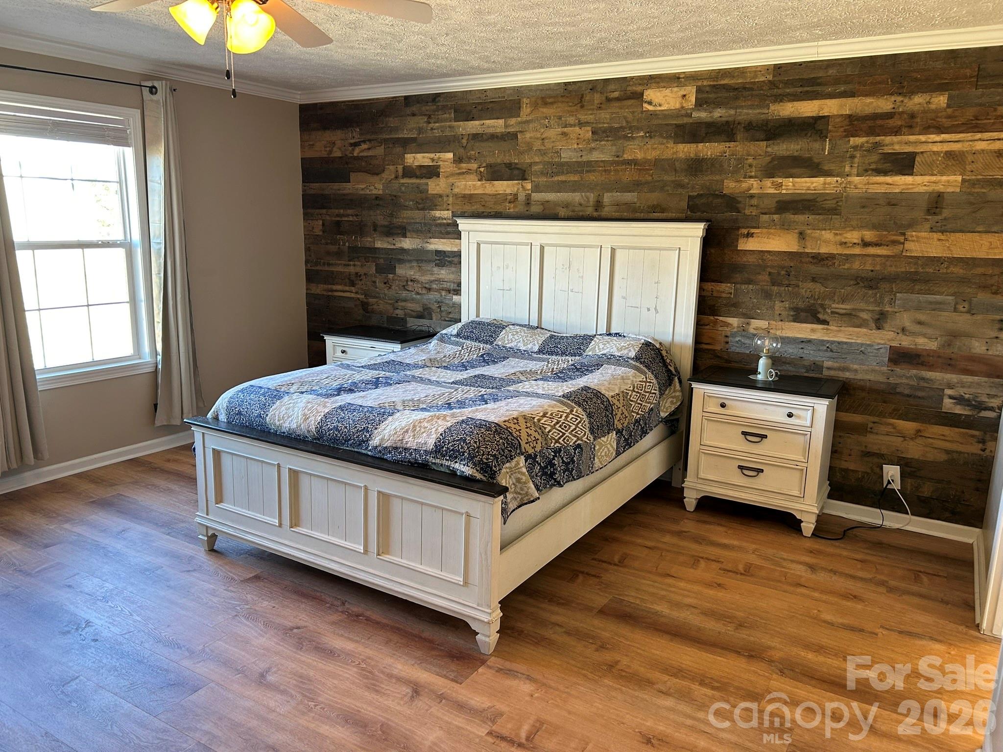 3343 Hollis Road Ellenboro, NC 28040 - Photo 26 of 48 a bed sitting in a room next to a window