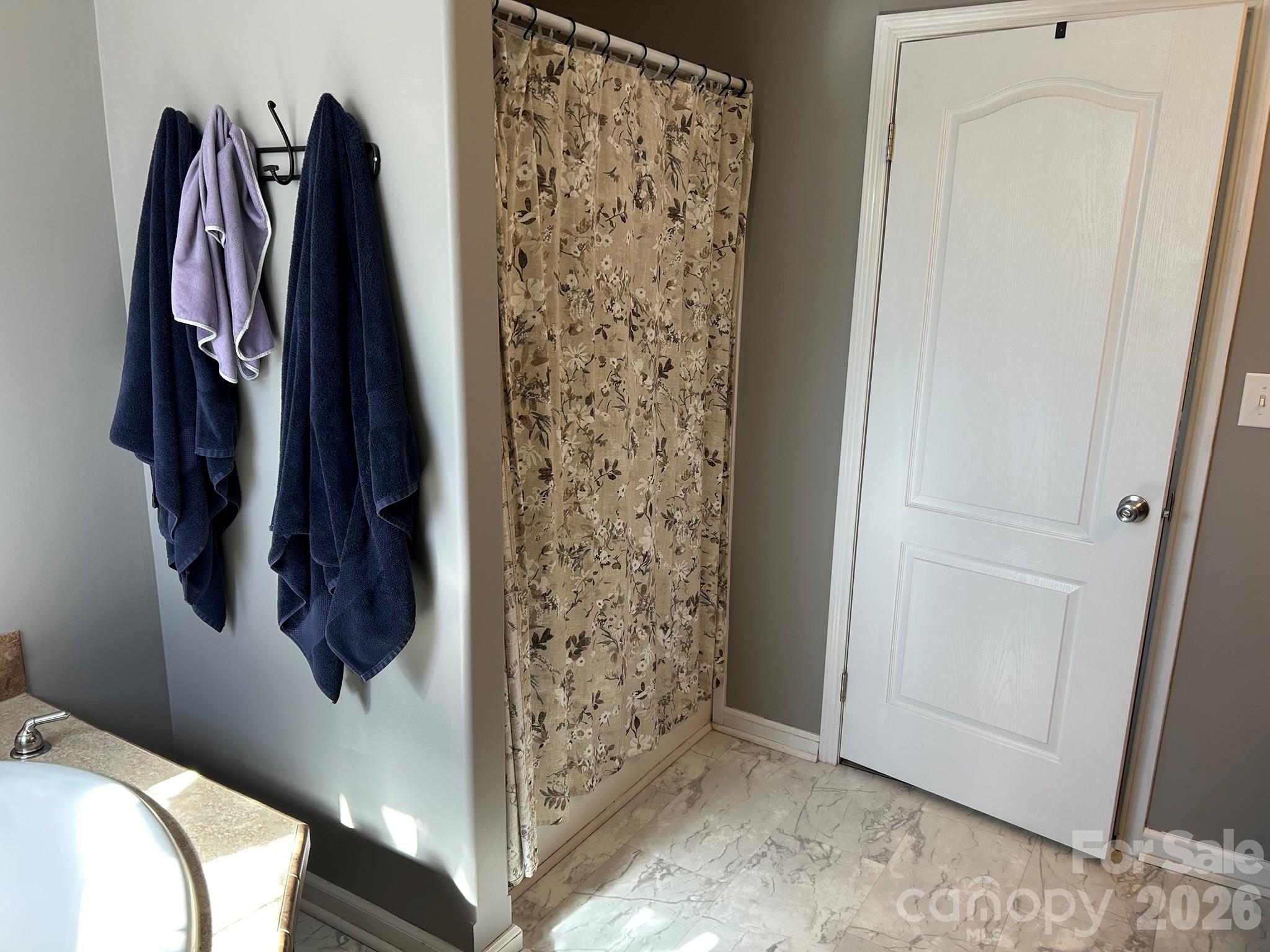 3343 Hollis Road Ellenboro, NC 28040 - Photo 32 of 48 a view of walk in closet with clothes