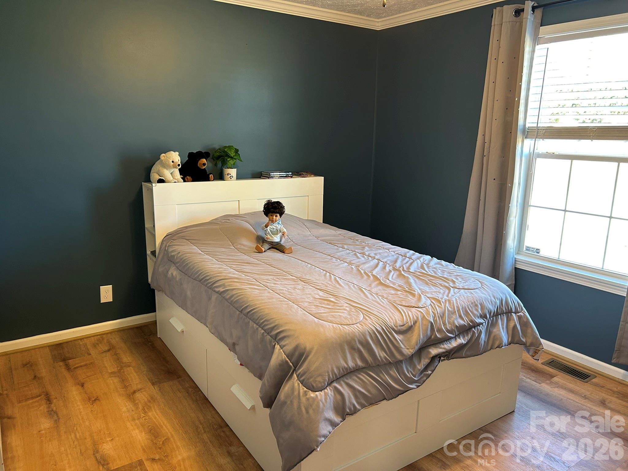 3343 Hollis Road Ellenboro, NC 28040 - Photo 35 of 48 a bedroom with a bed and window