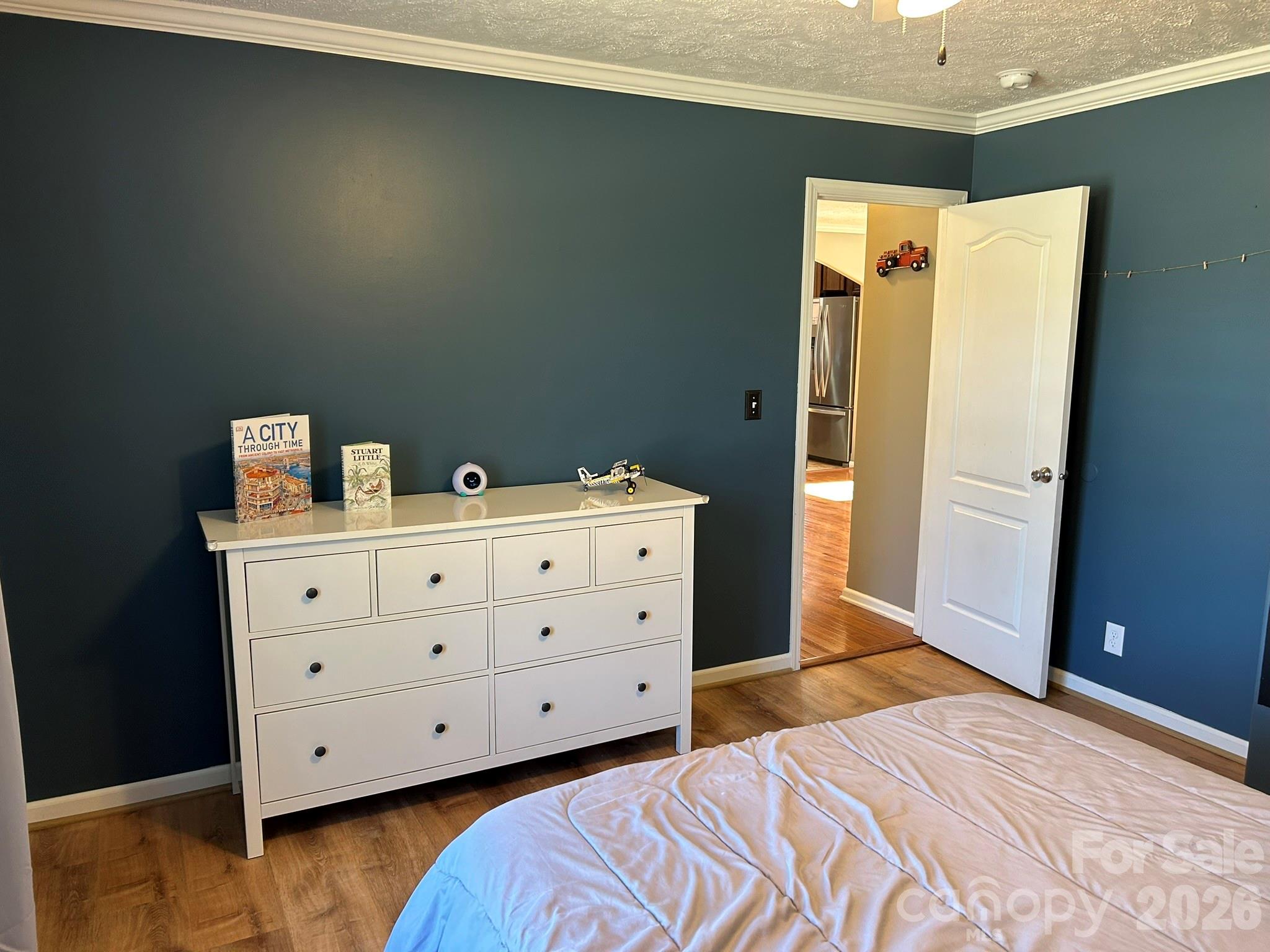 3343 Hollis Road Ellenboro, NC 28040 - Photo 36 of 48 a bedroom with a bed and a dresser