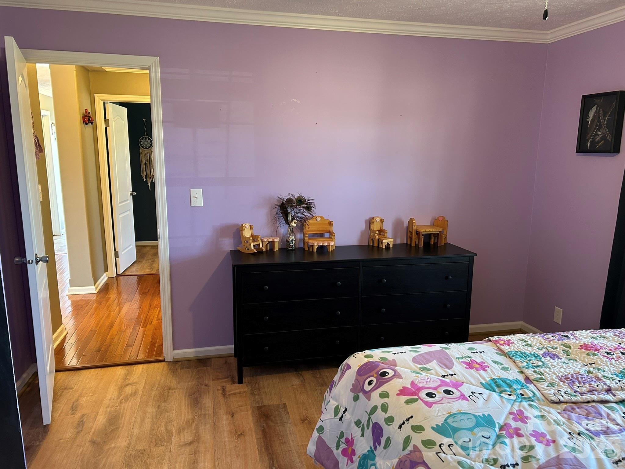 3343 Hollis Road Ellenboro, NC 28040 - Photo 38 of 48 a bedroom with a bed and a dresser