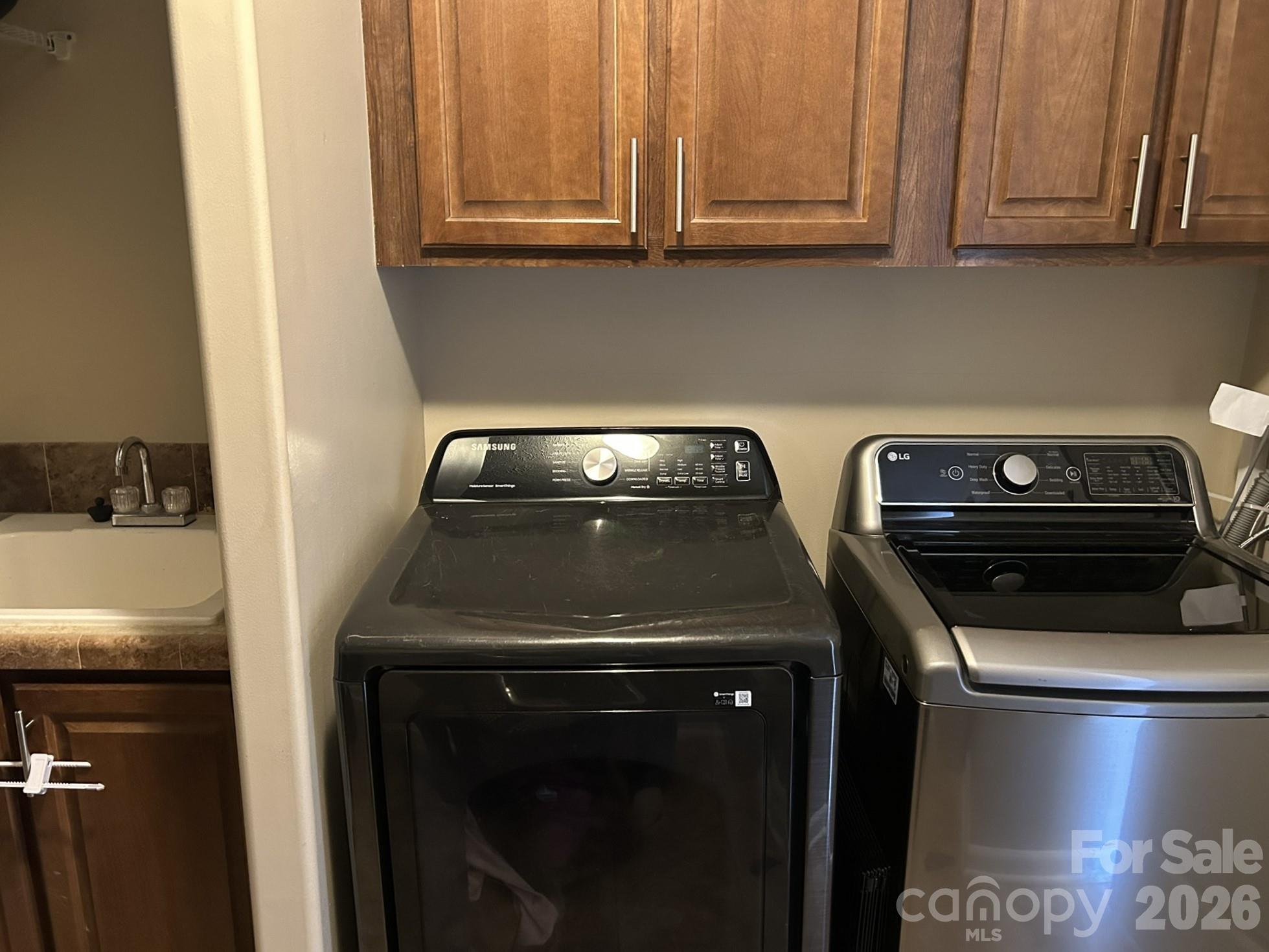 3343 Hollis Road Ellenboro, NC 28040 - Photo 41 of 48 a utility room with dryer and washer