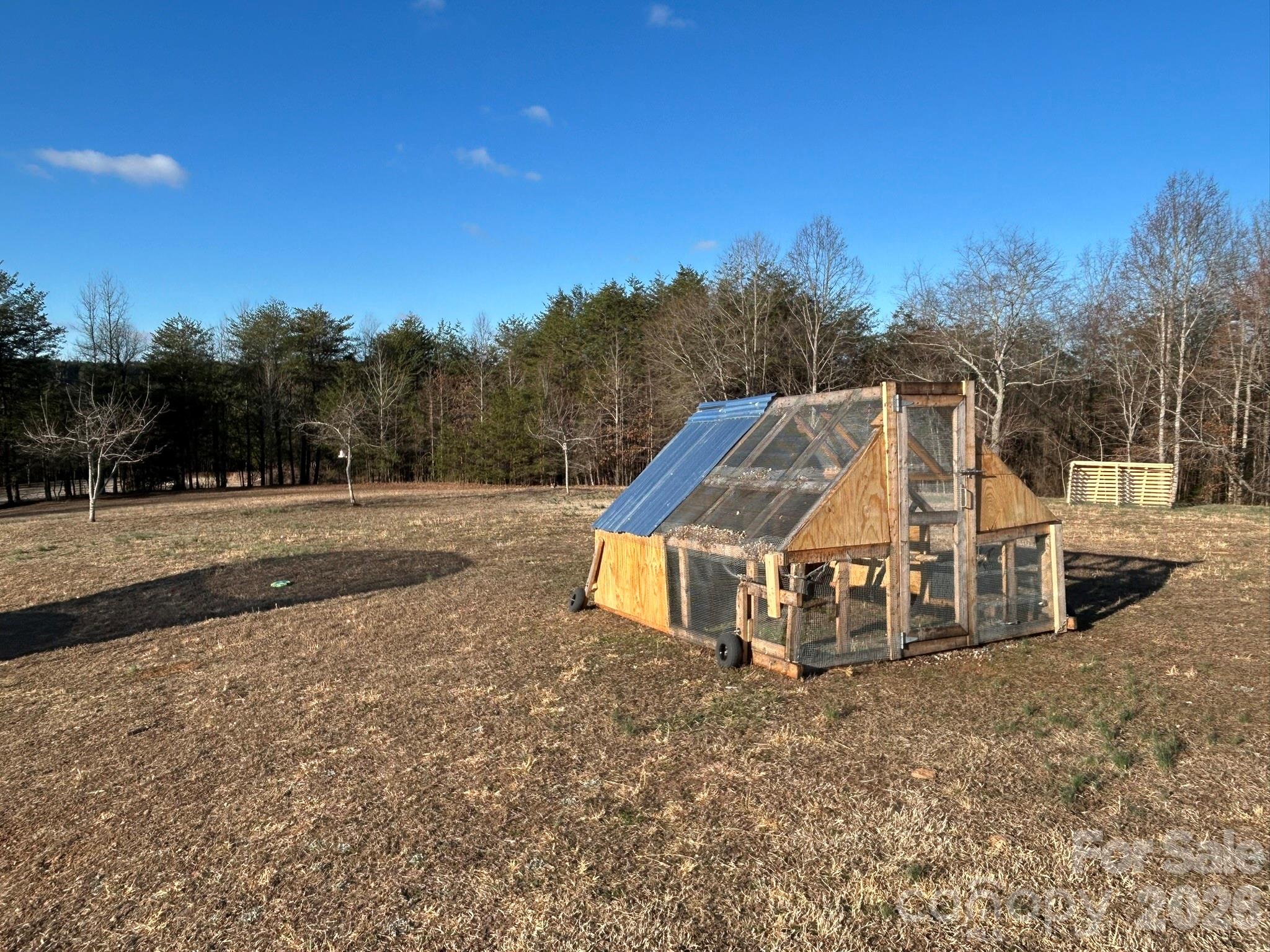 3343 Hollis Road Ellenboro, NC 28040 - Photo 44 of 48 a view of a houses with a yard