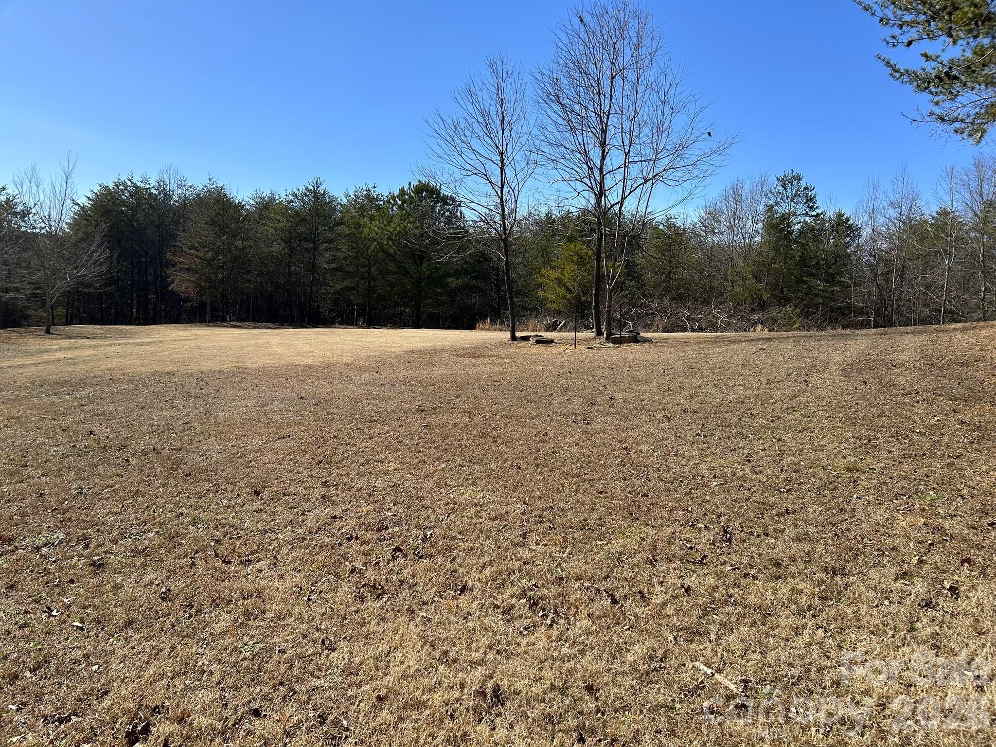 3343 Hollis Road Ellenboro, NC 28040 - Photo 7 of 48 a view of an outdoor space and a yard