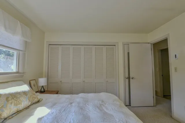 a view of livingroom with hardwood floor and bathroom