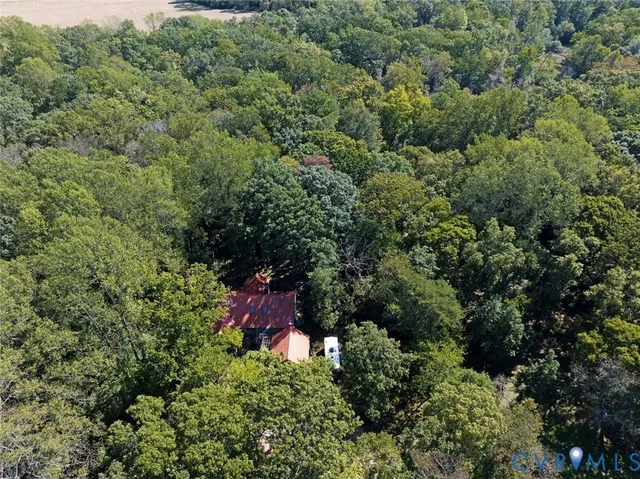 an aerial view of a houses with outdoor space and street view