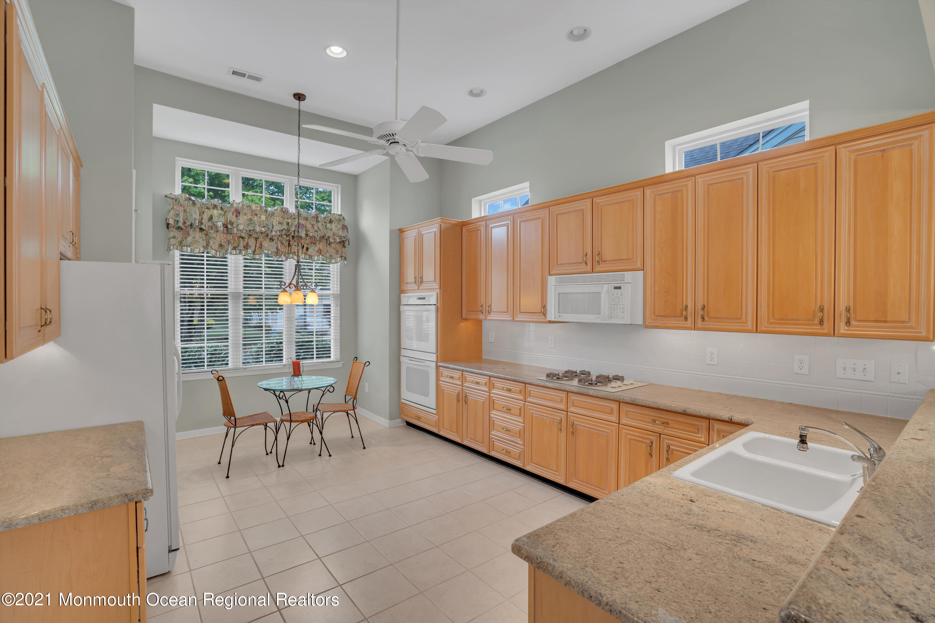 55 Shoal Road Jackson, NJ 08527 - Photo 13 of 55 a kitchen with granite countertop a sink cabinets and window