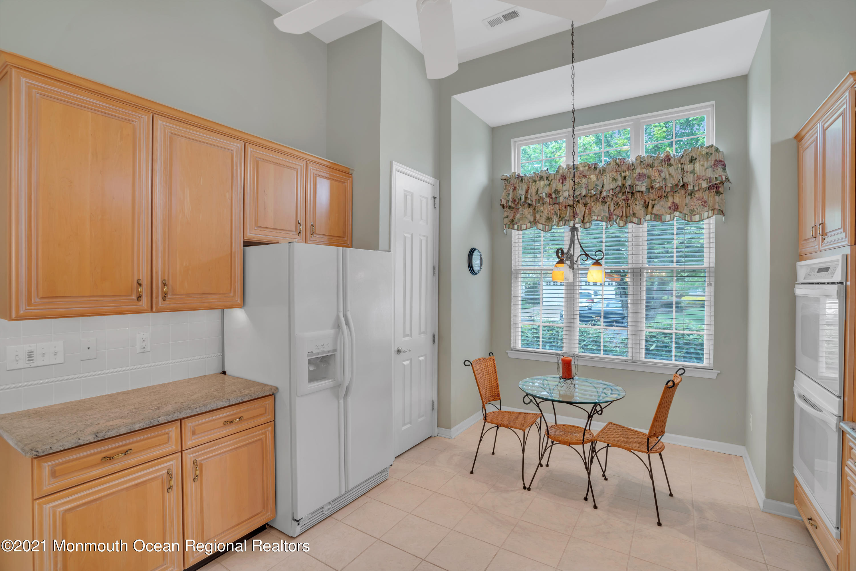55 Shoal Road Jackson, NJ 08527 - Photo 14 of 55 a kitchen with stainless steel appliances granite countertop a refrigerator and a wooden cabinets