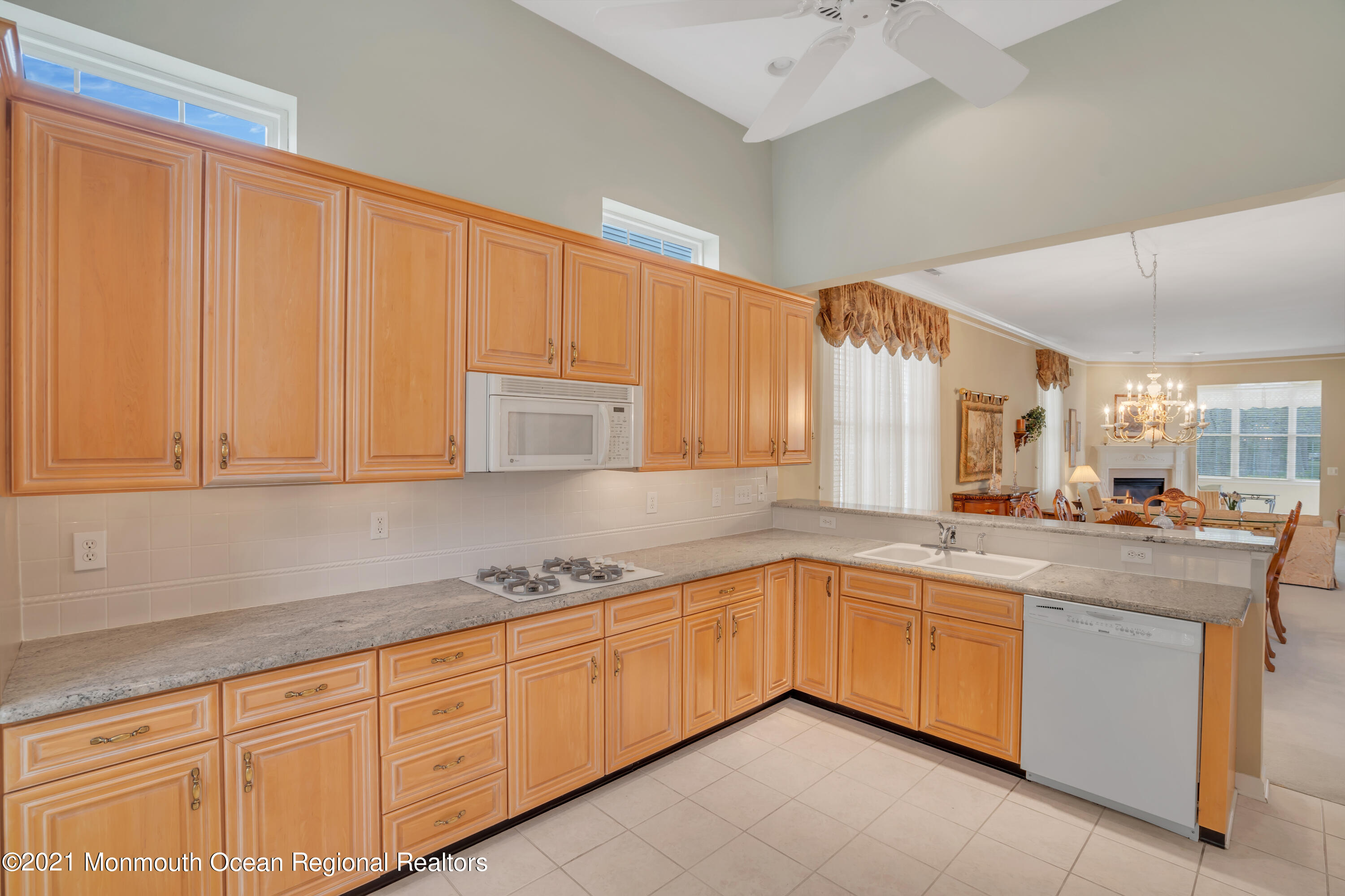 55 Shoal Road Jackson, NJ 08527 - Photo 17 of 55 a kitchen with sink cabinets and window