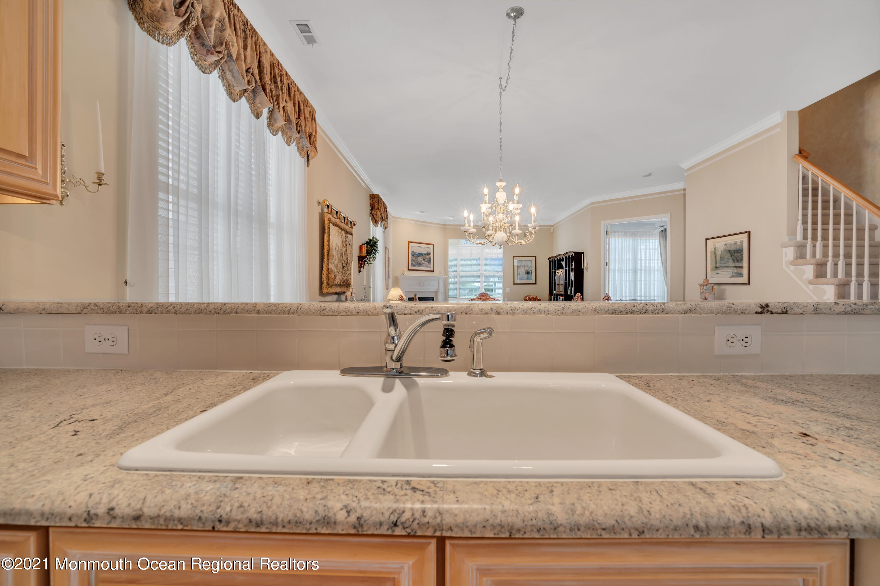 55 Shoal Road Jackson, NJ 08527 - Photo 18 of 55 a bathroom with a sink a mirror and a bathtub