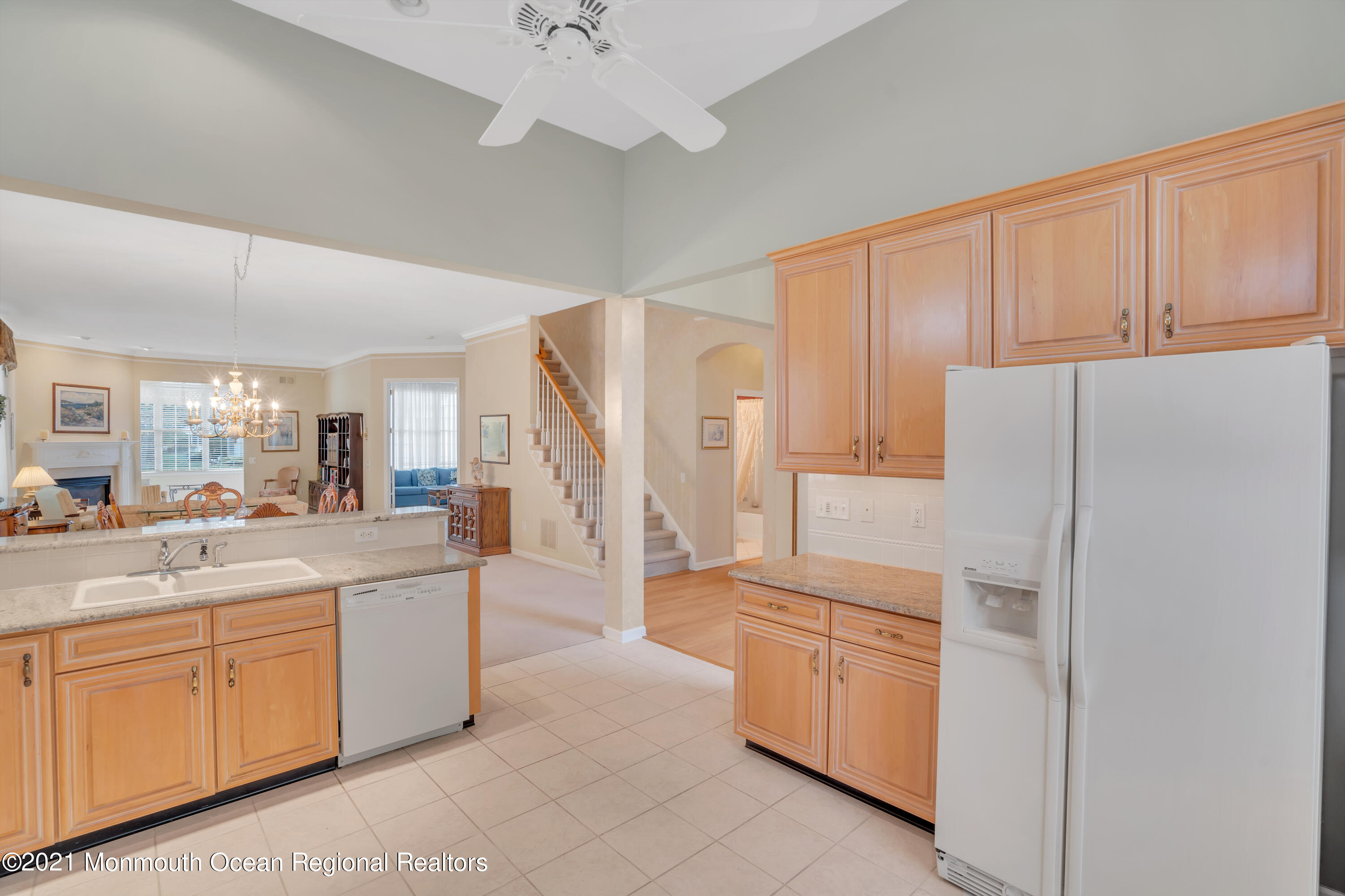 55 Shoal Road Jackson, NJ 08527 - Photo 19 of 55 a kitchen with a refrigerator a sink and dishwasher with white cabinets