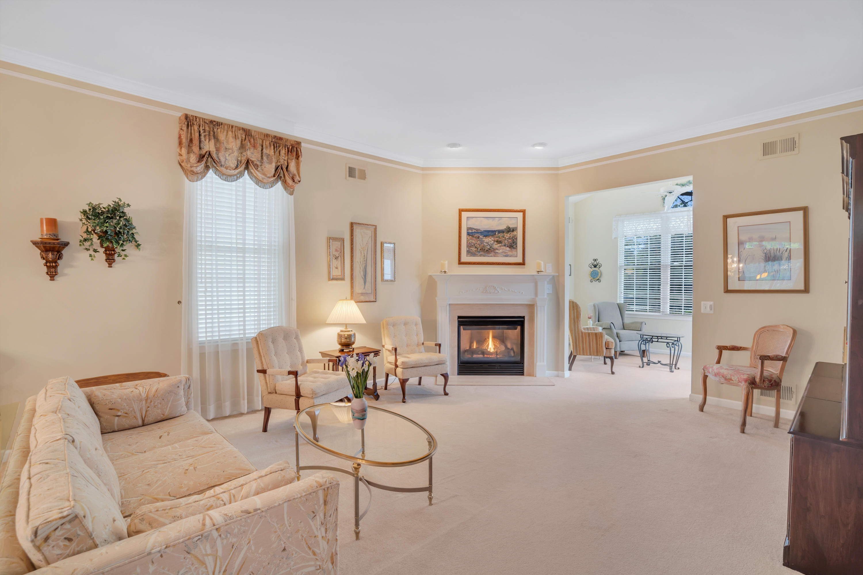 55 Shoal Road Jackson, NJ 08527 - Photo 25 of 55 a living room with furniture and a fireplace