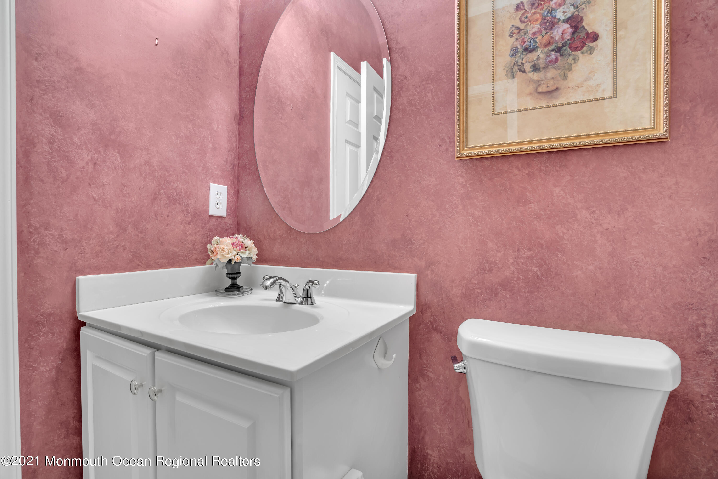 55 Shoal Road Jackson, NJ 08527 - Photo 34 of 55 a bathroom with a sink and a mirror