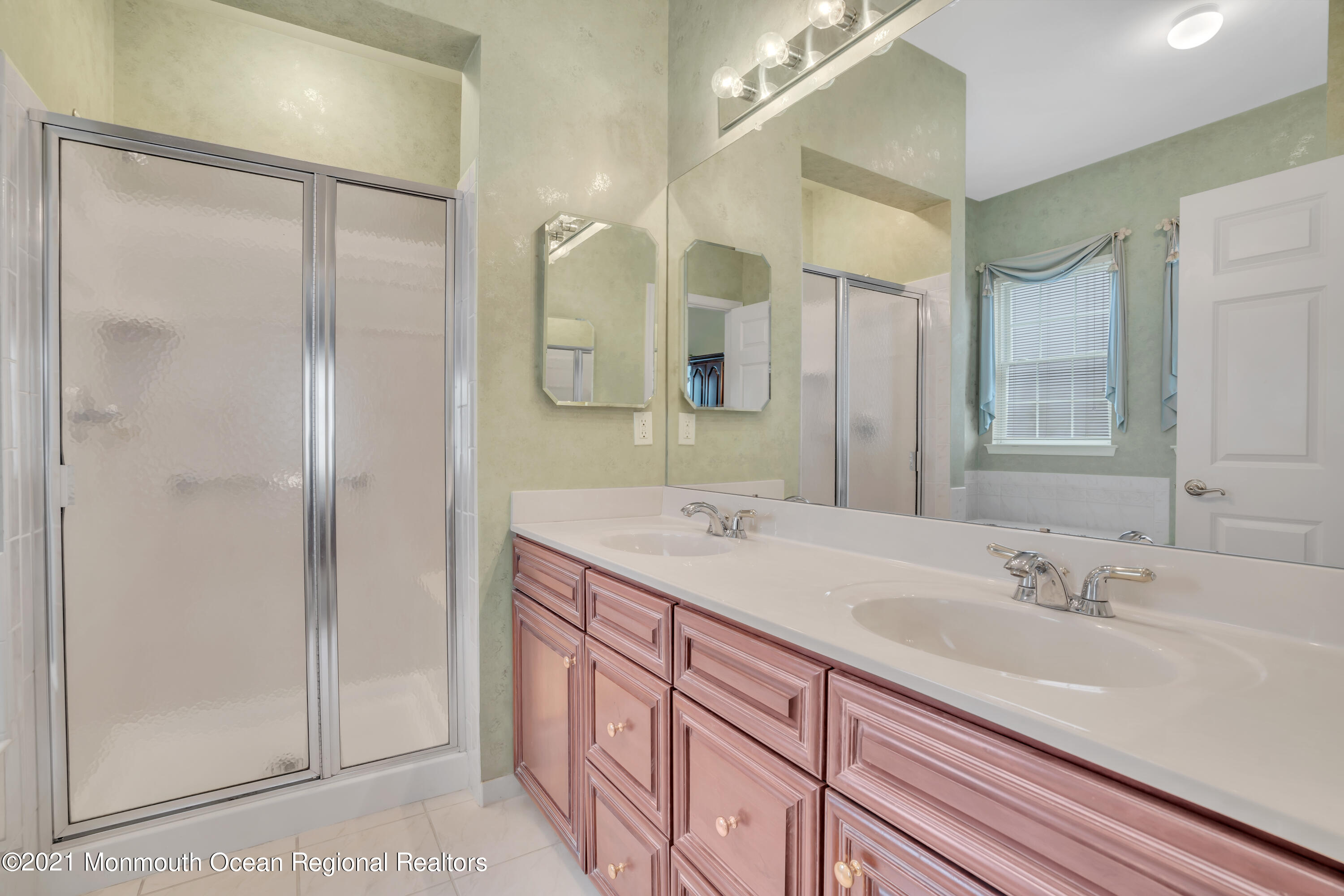 55 Shoal Road Jackson, NJ 08527 - Photo 36 of 55 a bathroom with a sink and a mirror