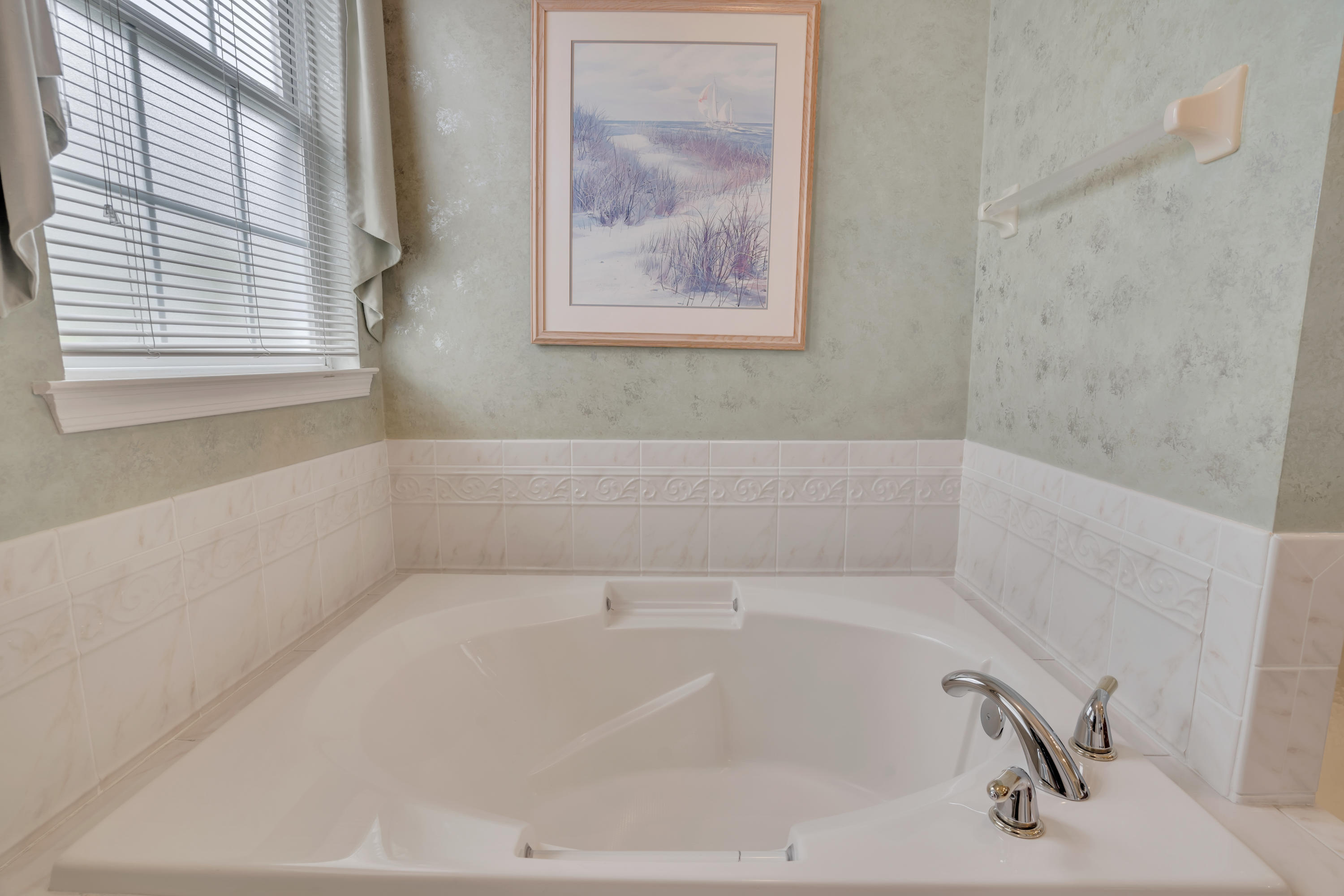 55 Shoal Road Jackson, NJ 08527 - Photo 37 of 55 a white bath tub sitting next to a window