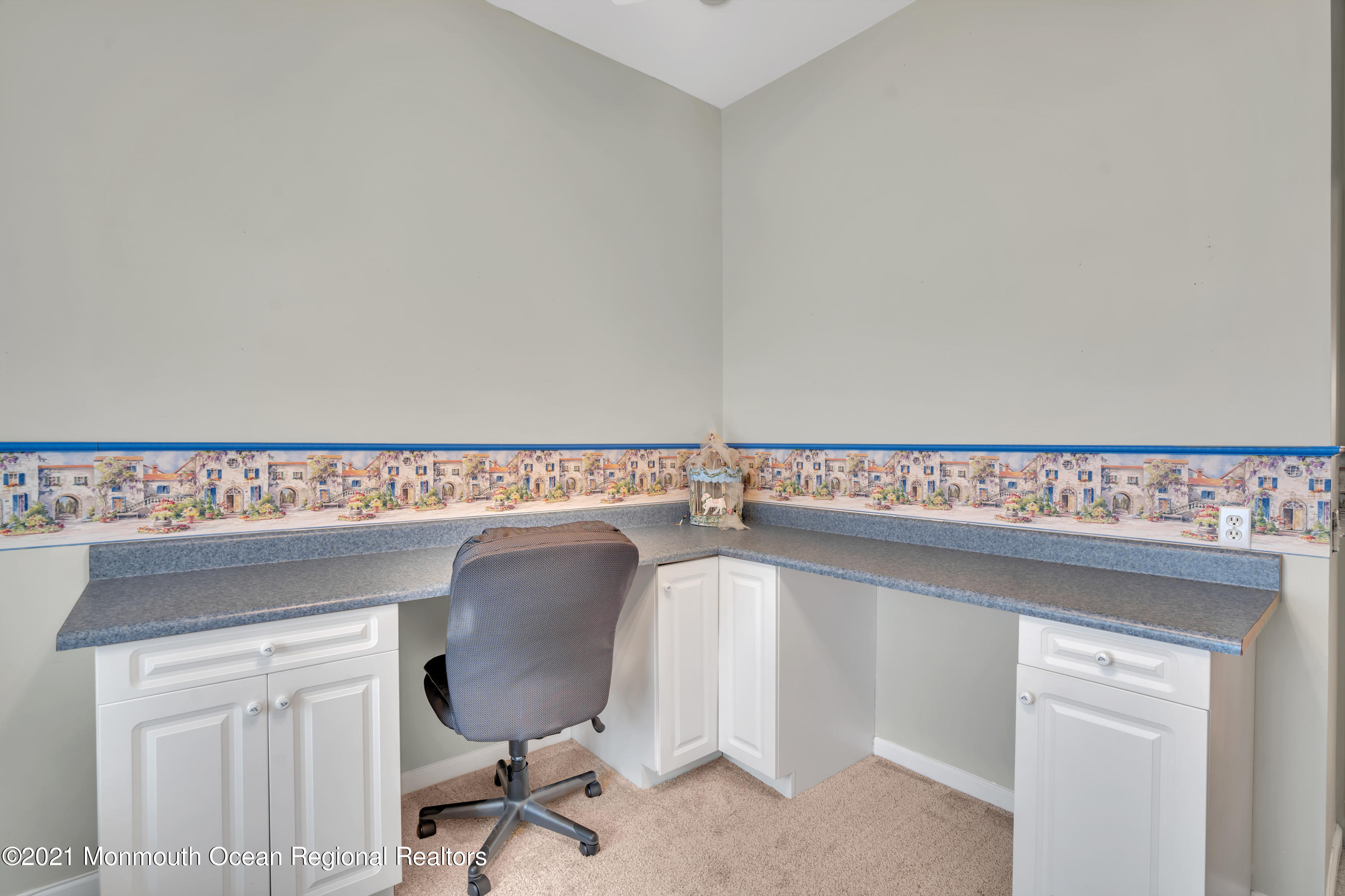 55 Shoal Road Jackson, NJ 08527 - Photo 38 of 55 a view of a kitchen with a sink and a chair