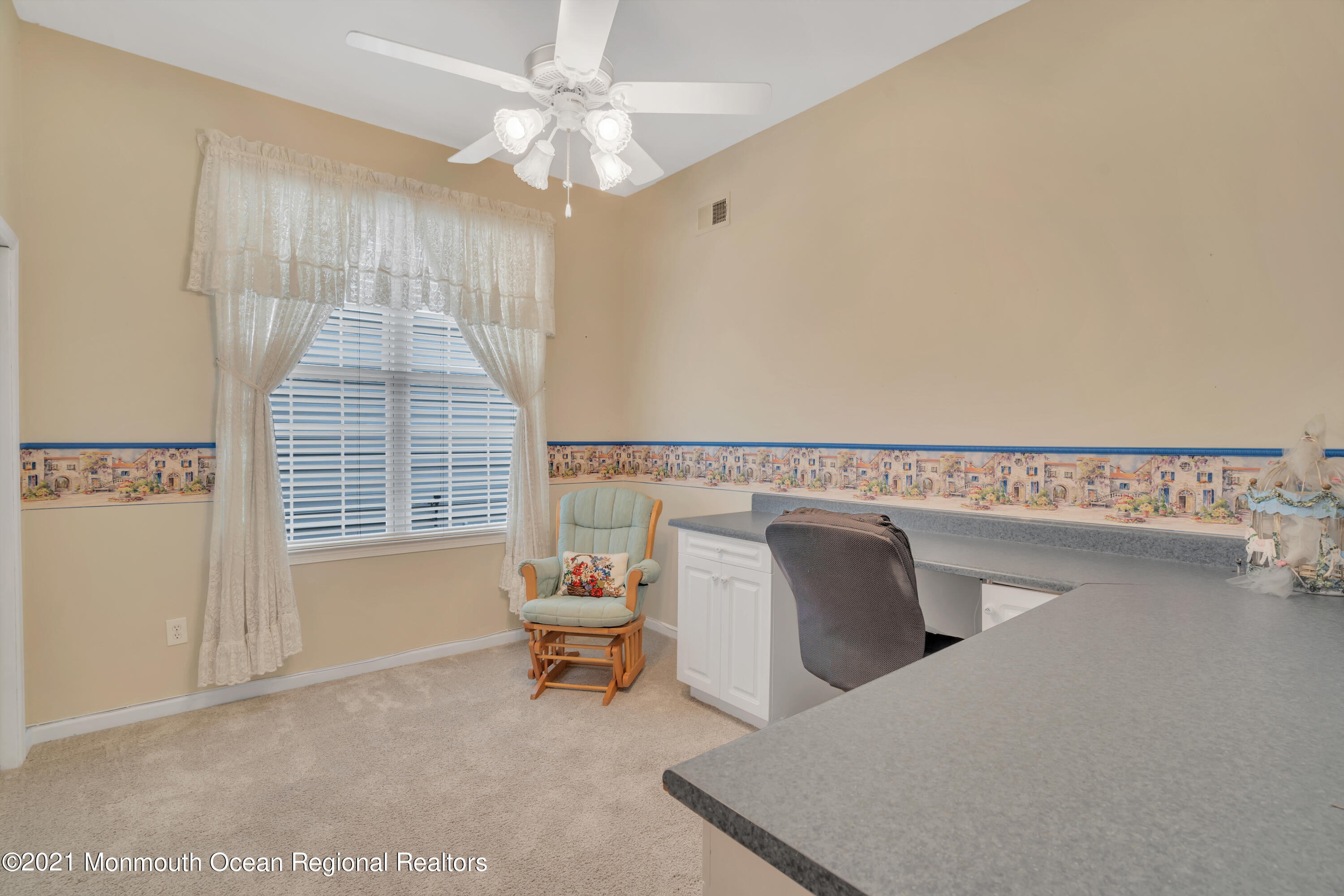 55 Shoal Road Jackson, NJ 08527 - Photo 39 of 55 a living room with furniture and a window