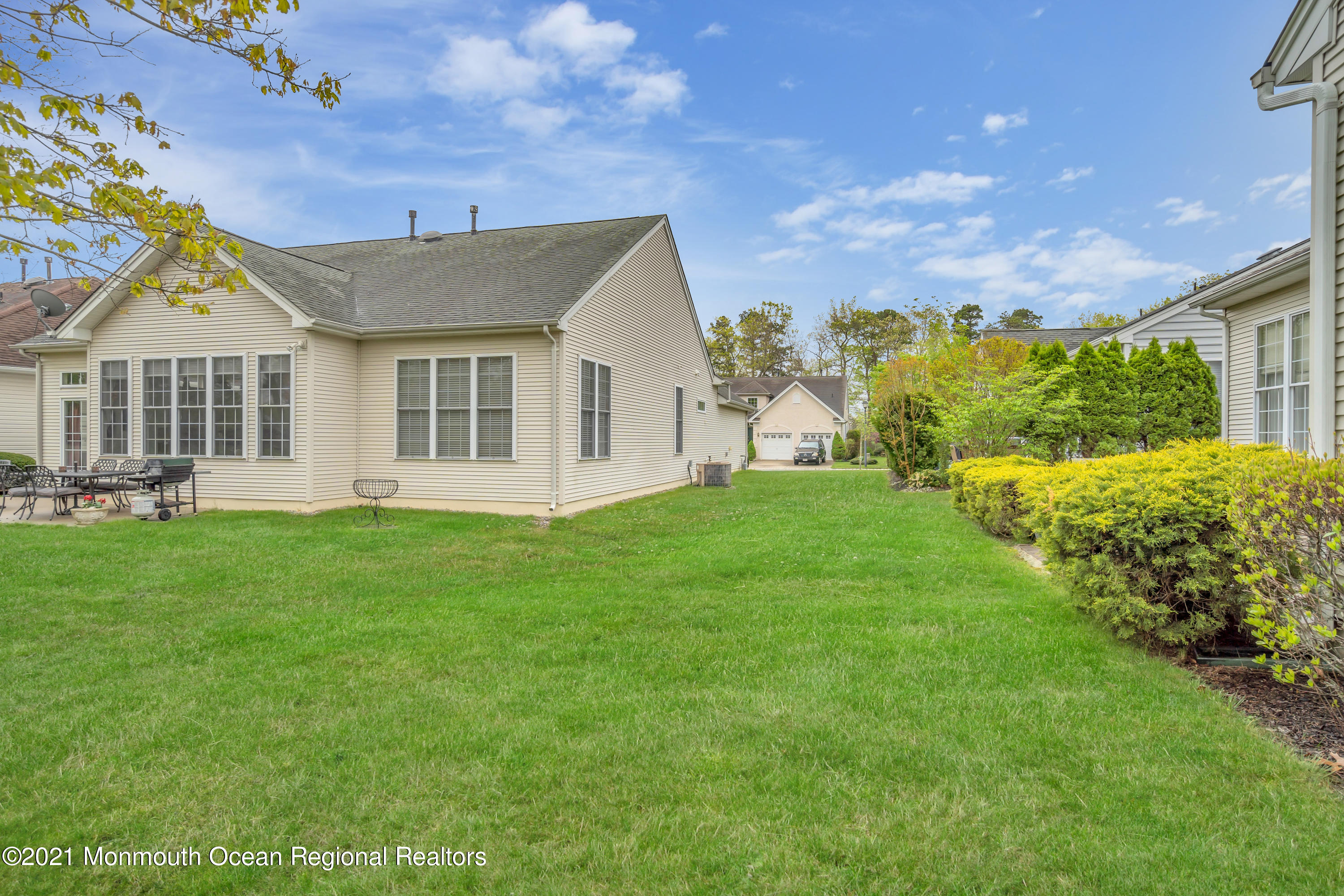 55 Shoal Road Jackson, NJ 08527 - Photo 45 of 55 a front view of a house with a garden