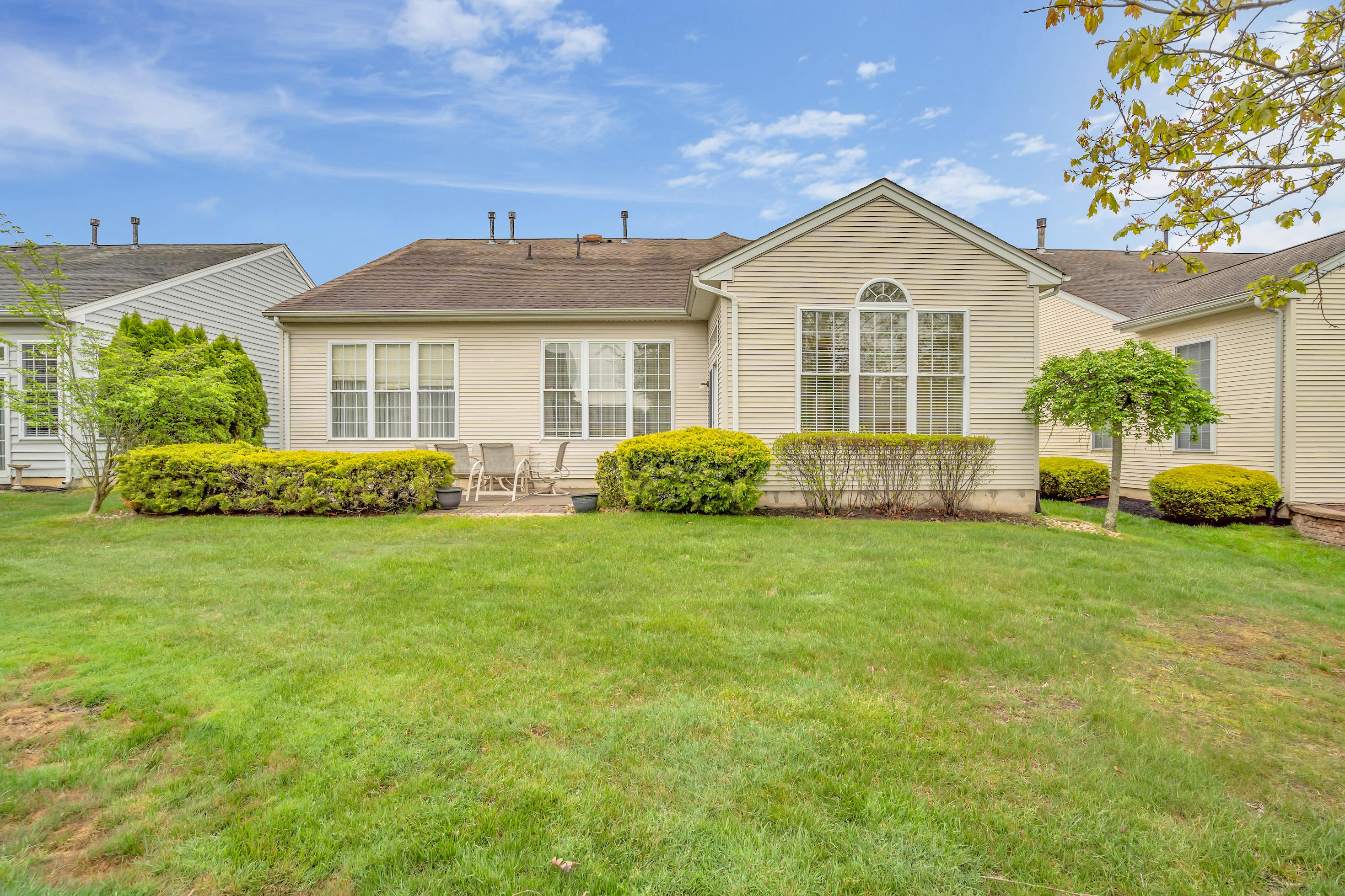 55 Shoal Road Jackson, NJ 08527 - Photo 47 of 55 a front view of a house with garden