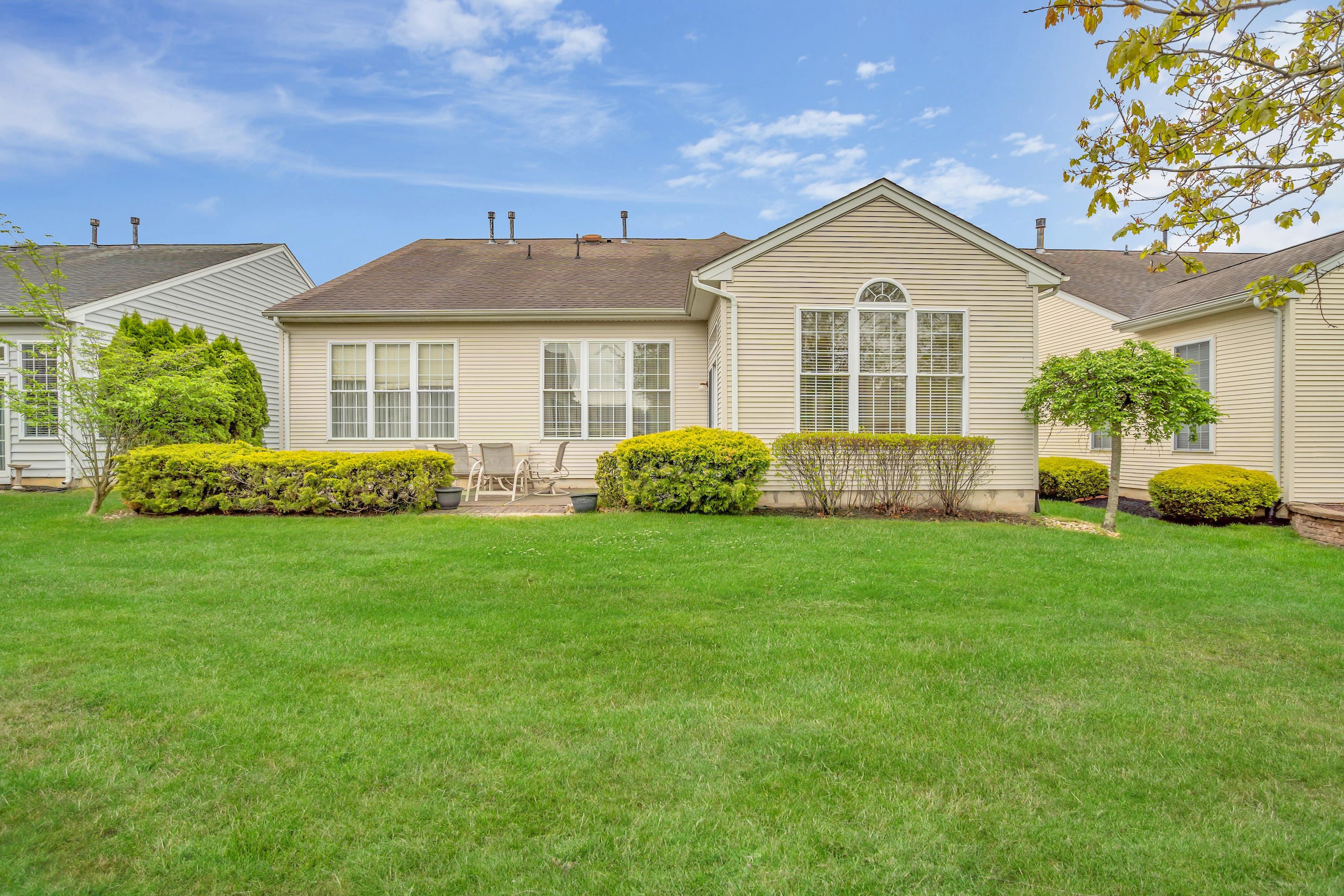55 Shoal Road Jackson, NJ 08527 - Photo 6 of 55 a front view of a house with garden