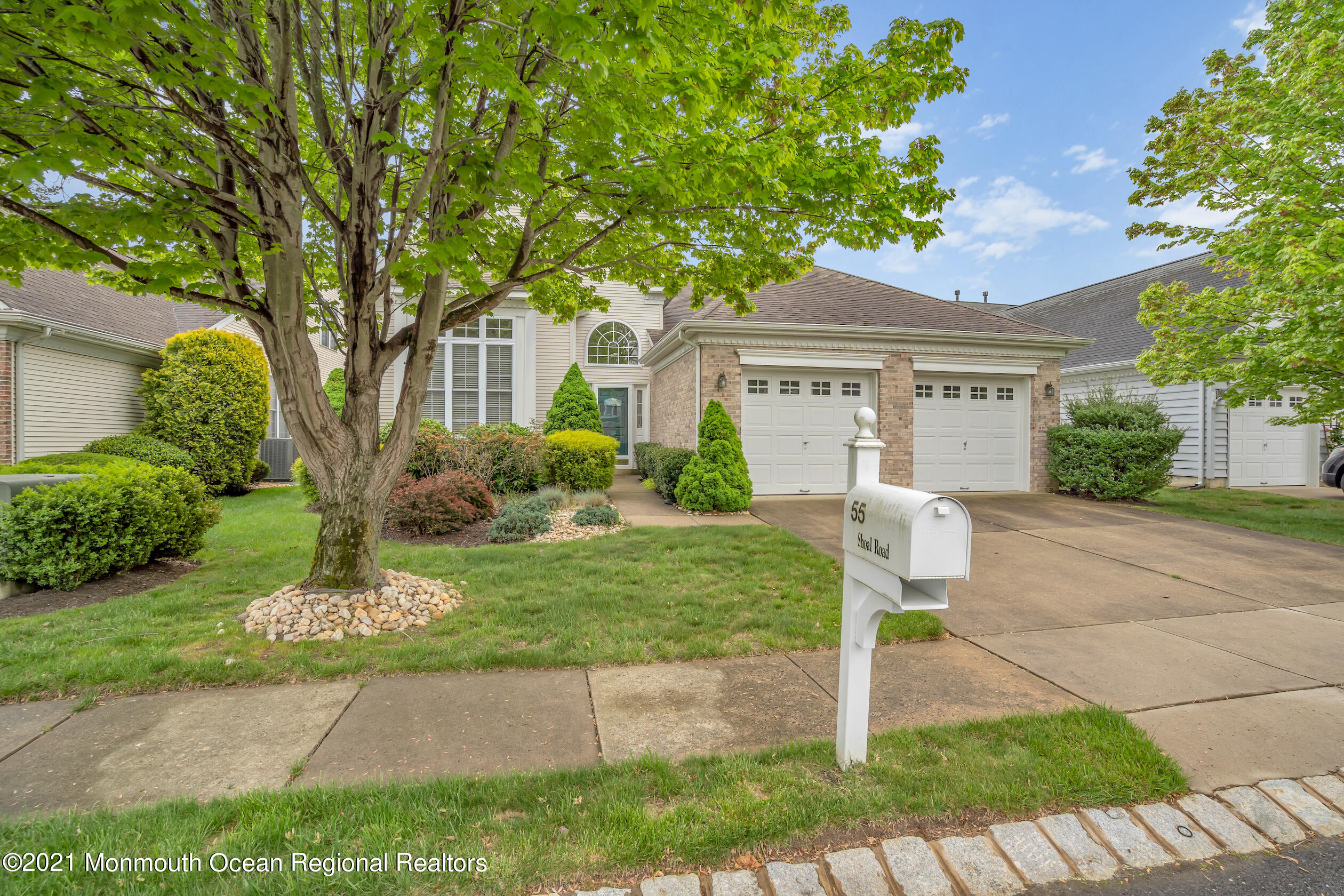 55 Shoal Road Jackson, NJ 08527 - Photo 51 of 55 a front view of a house with garden