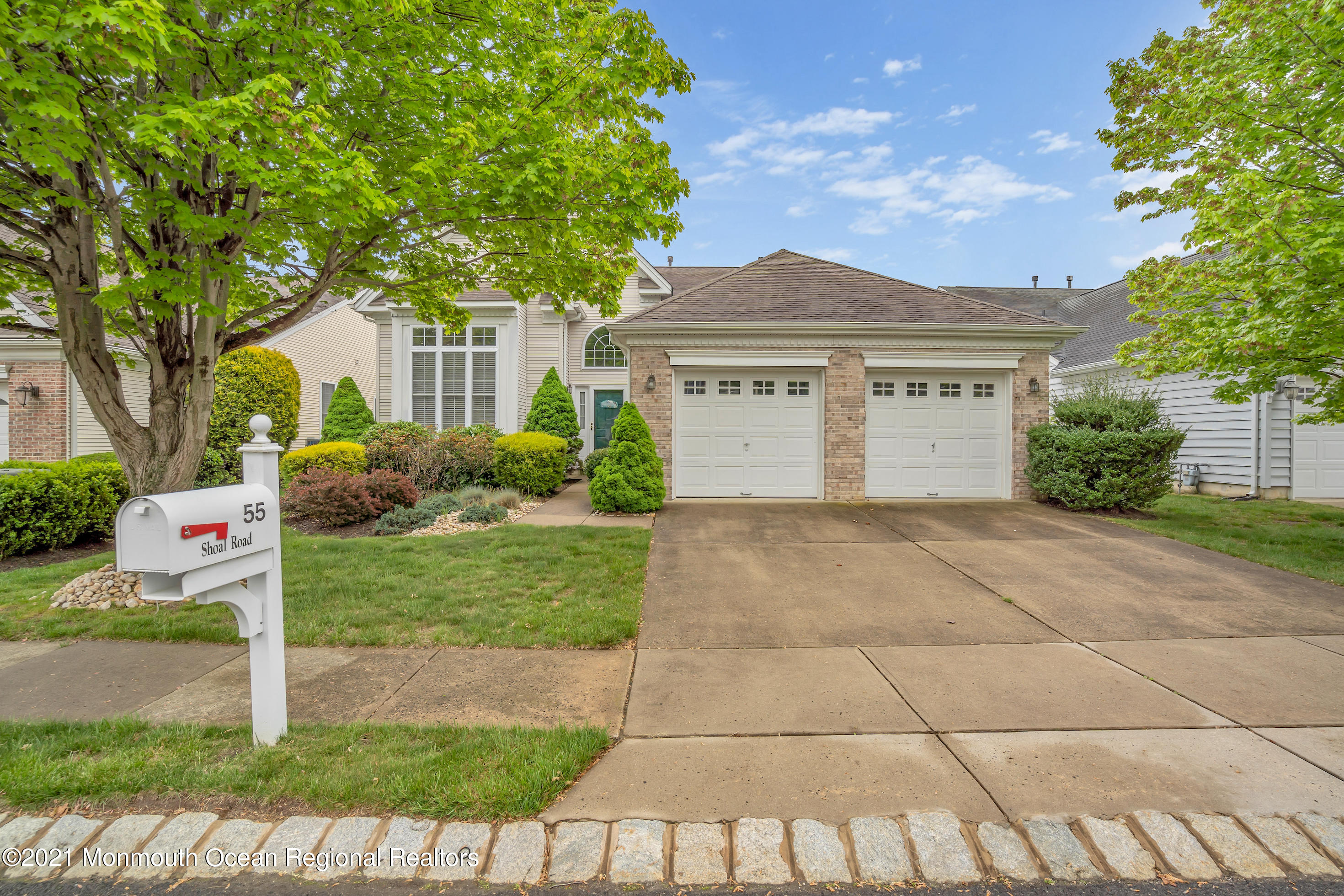 55 Shoal Road Jackson, NJ 08527 - Photo 52 of 55 a front view of a house with garden