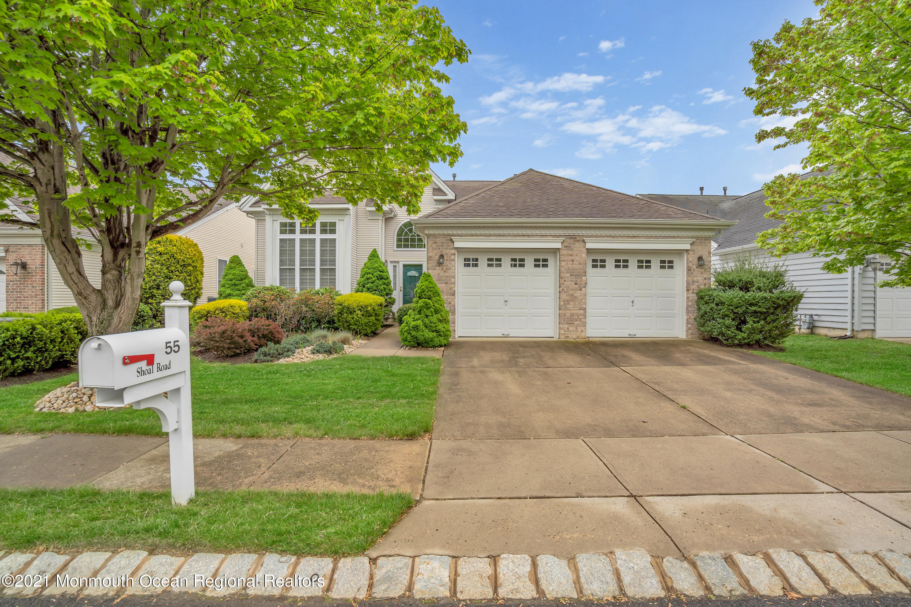 55 Shoal Road Jackson, NJ 08527 - Photo 54 of 55 a front view of a house with garden