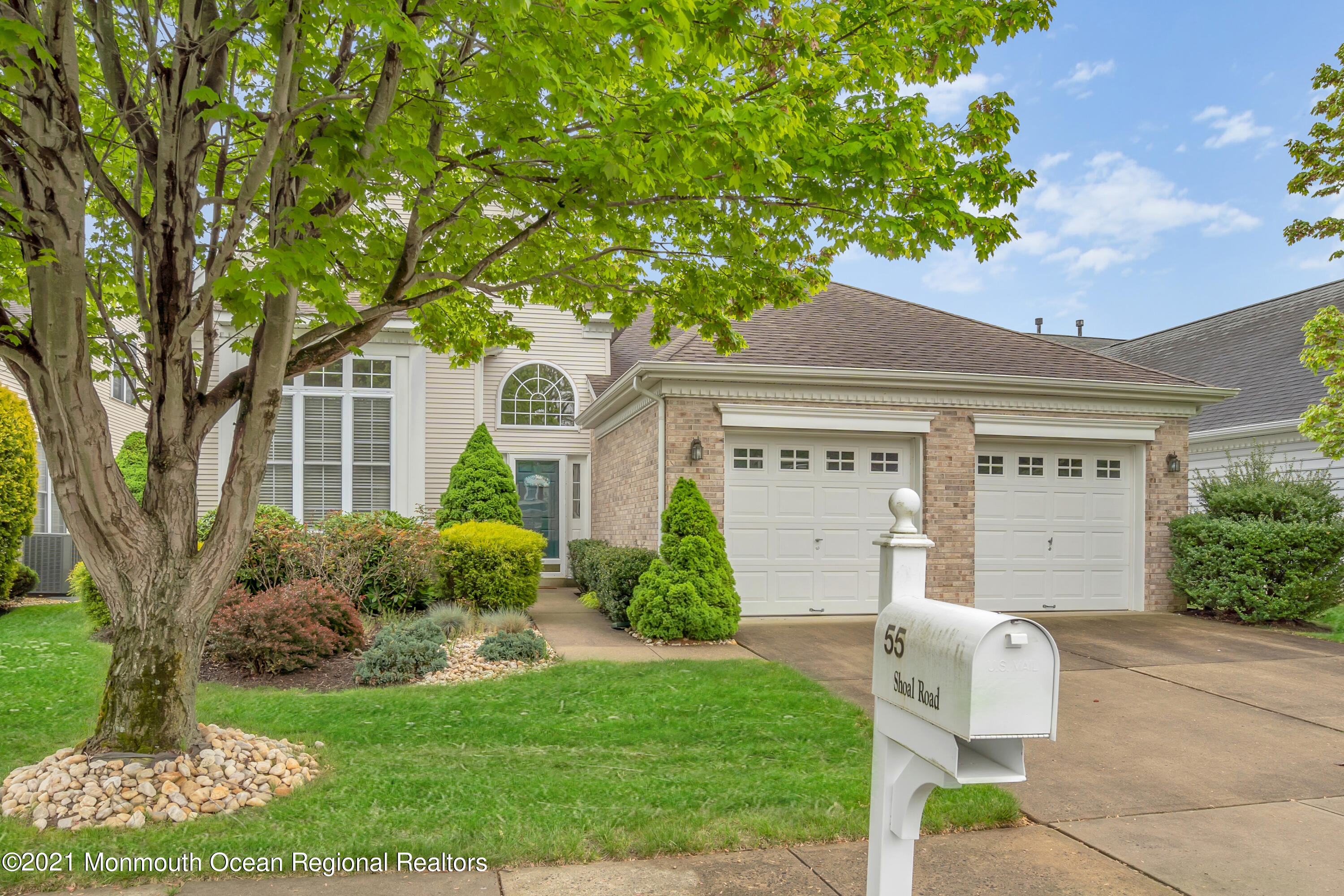 55 Shoal Road Jackson, NJ 08527 - Photo 55 of 55 a front view of a house with garden