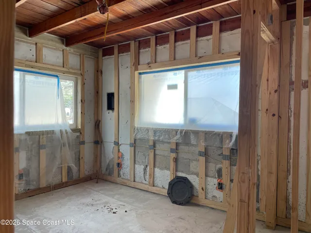 a view of a bathroom with a glass door