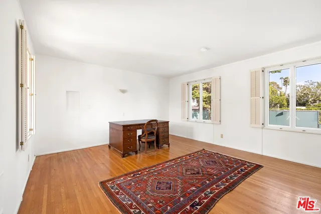 a view of a livingroom with furniture and window