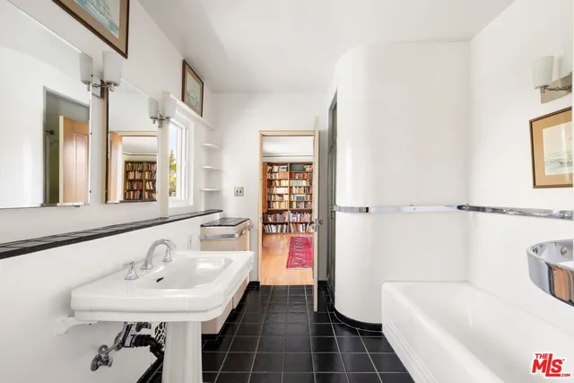a bathroom with a sink and a bathtub