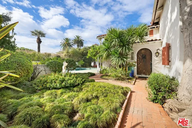 a view of a garden with a fountain
