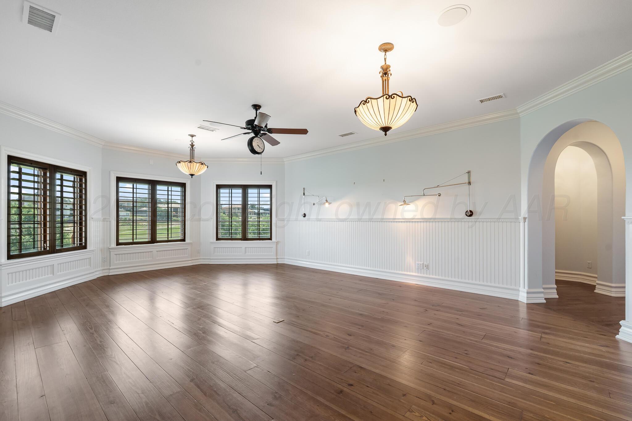 18 Cypress Point Amarillo, TX 79124 - Photo 70 of 95 wooden floor in an empty room with a window
