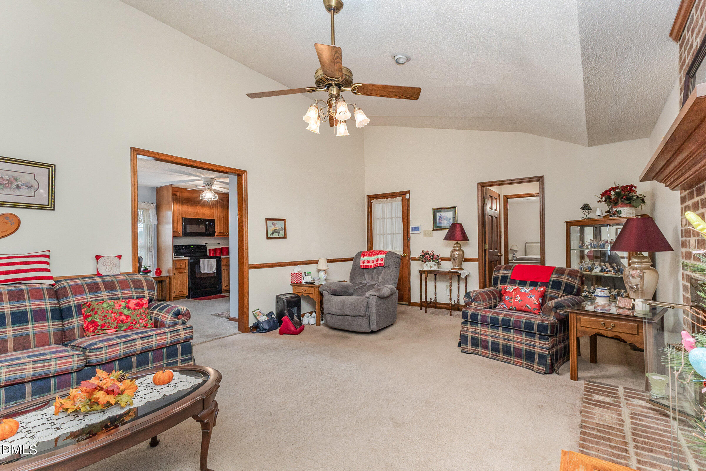 390 Sandy Ridge Road Dunn, NC 28334 - Photo 11 of 45 a living room with lots of furniture and toys