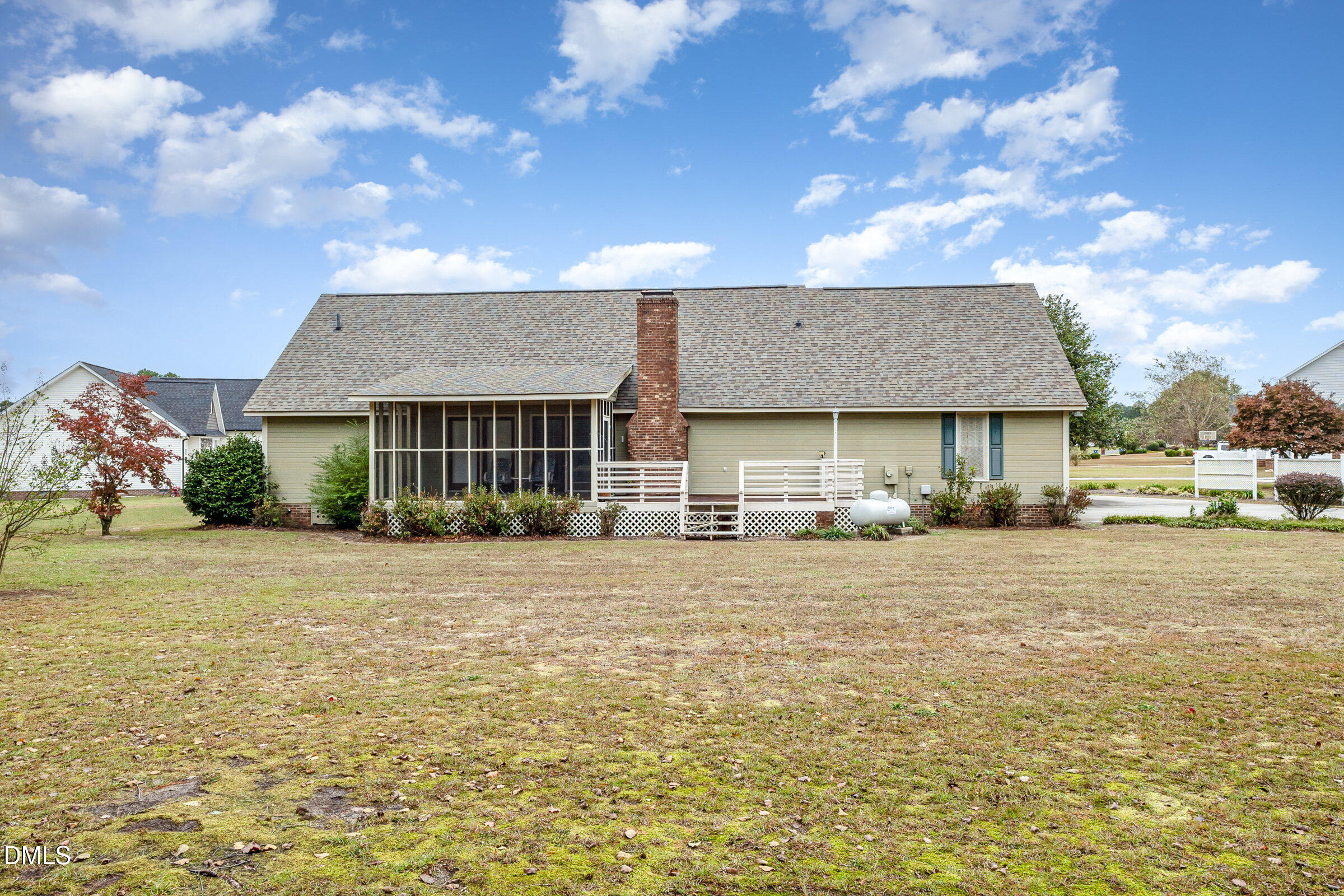390 Sandy Ridge Road Dunn, NC 28334 - Photo 43 of 45 a view of a house with a yard and garage