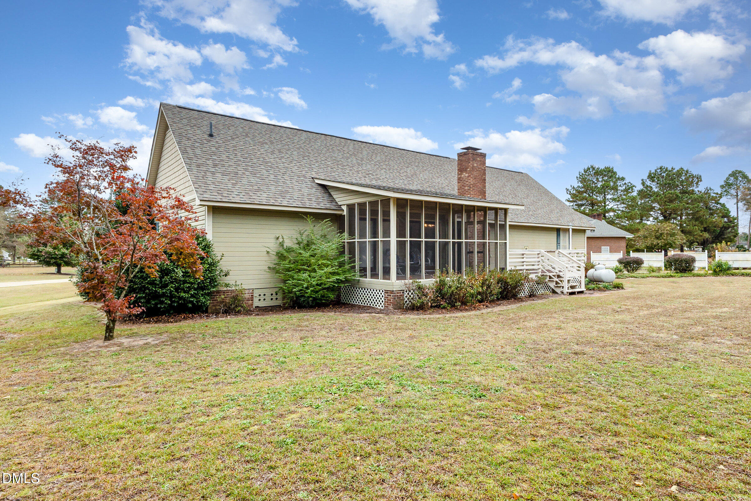 390 Sandy Ridge Road Dunn, NC 28334 - Photo 4 of 45 a front view of a house with garden