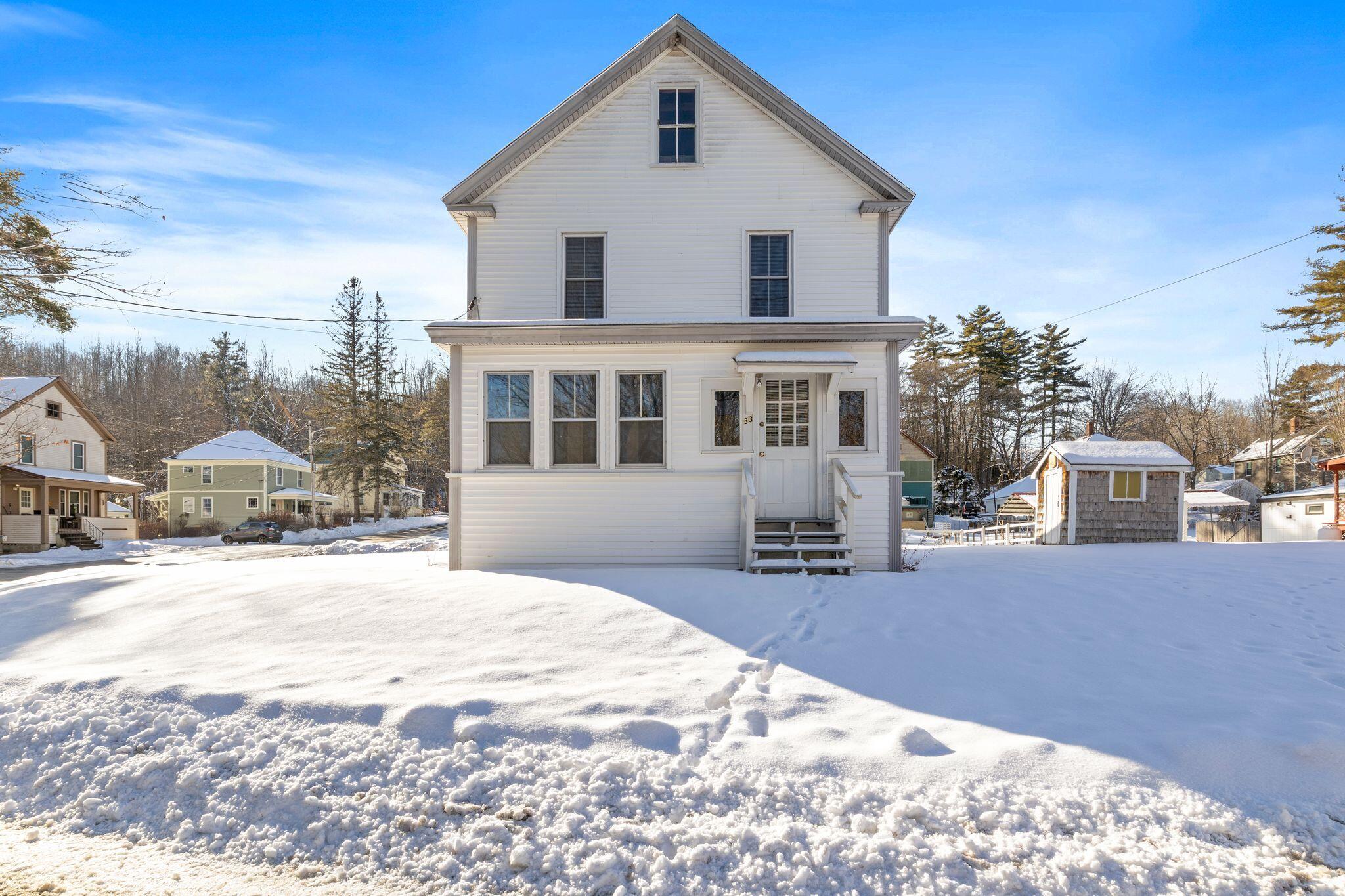 33 Maple Street Limerick, ME 04048 - Photo 2 of 38 Front of home, corner lot
