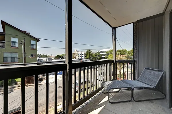 a view of a building from a balcony