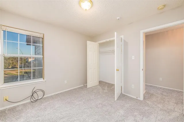 a view of a room with windows